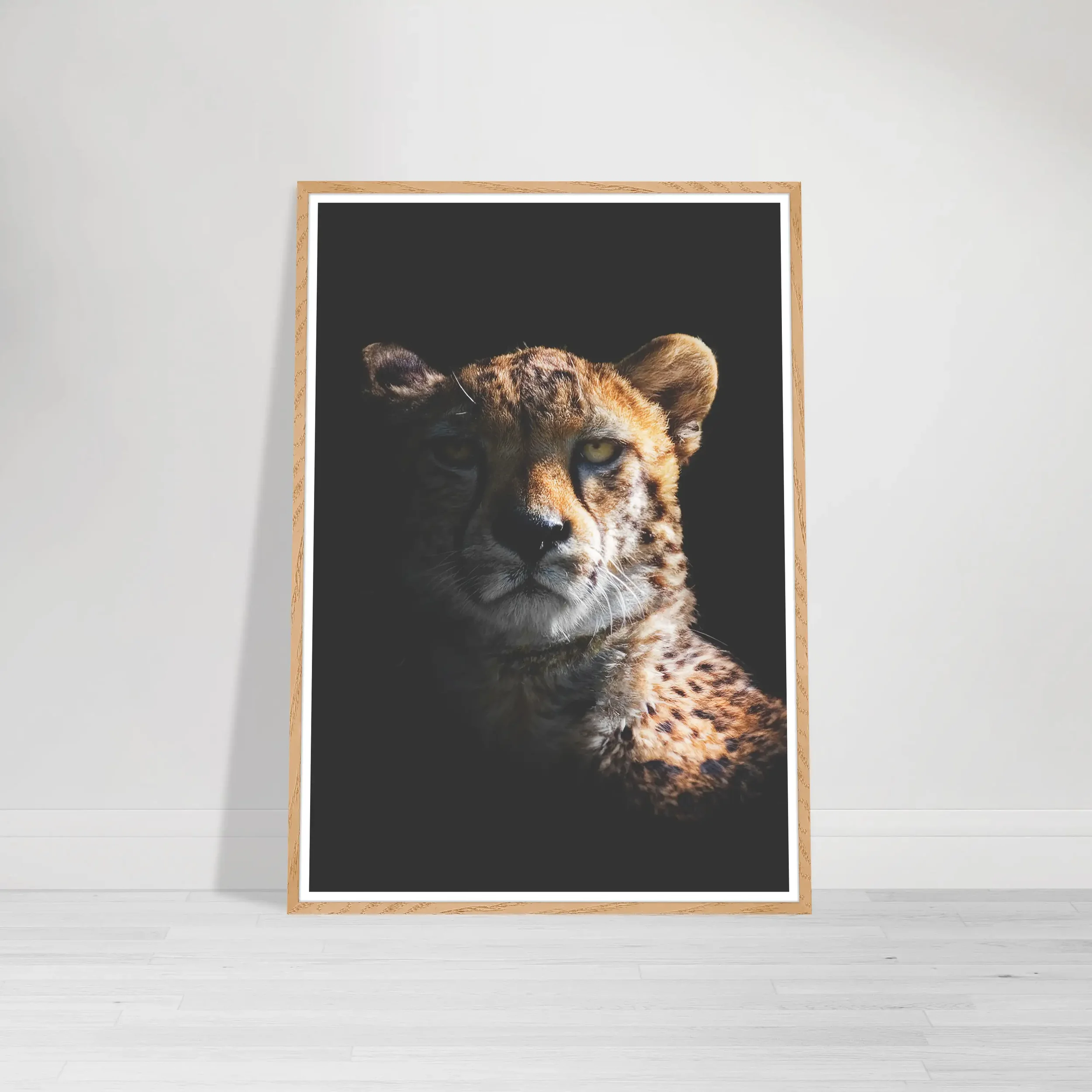 'Cheetah' print in a natural wood frame, adding an organic, grounded feel that perfectly complements the predator’s natural habitat.