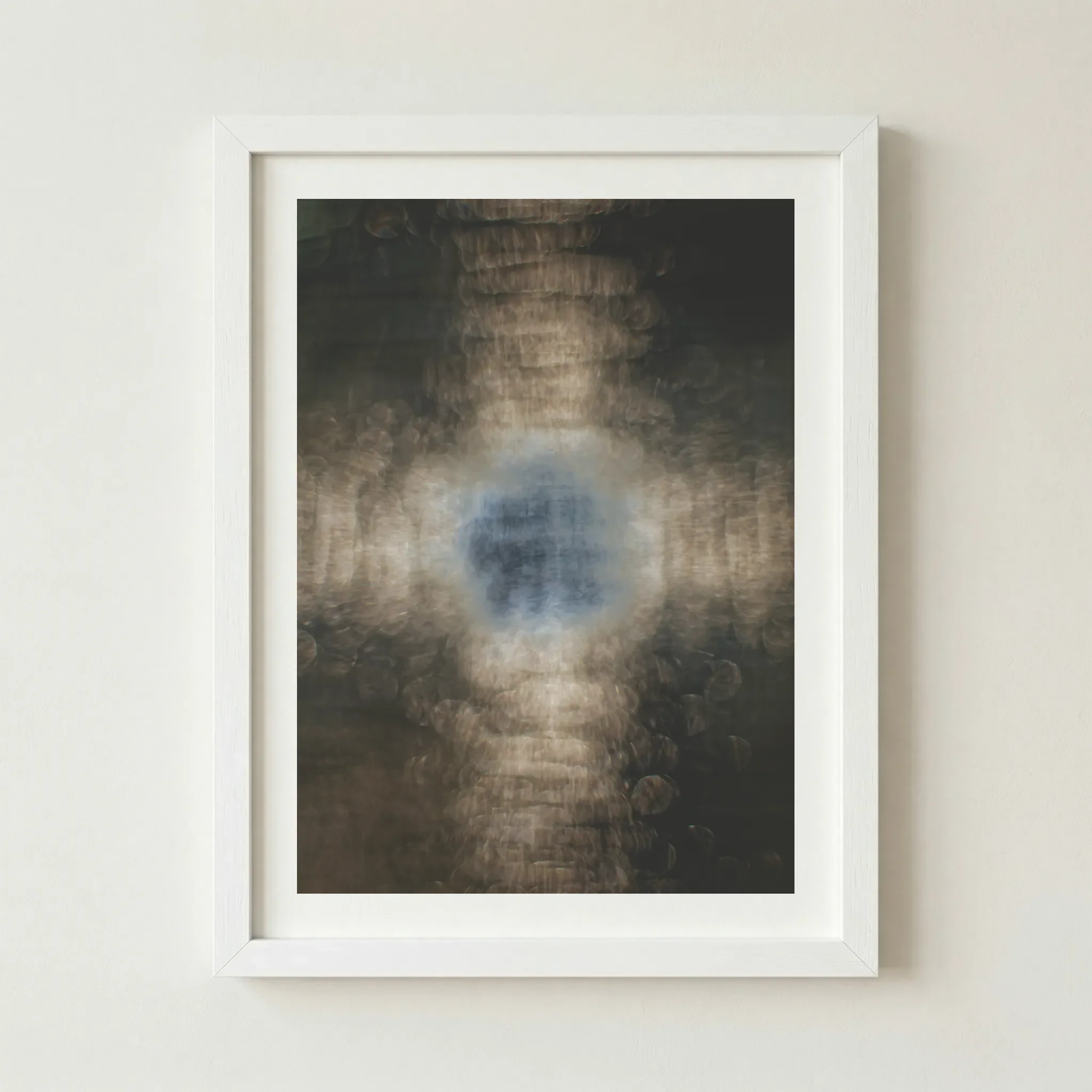 'Evolution' abstract print in a white frame, creating a sharp, modern contrast that highlights the bright, expanding energy of personal growth.