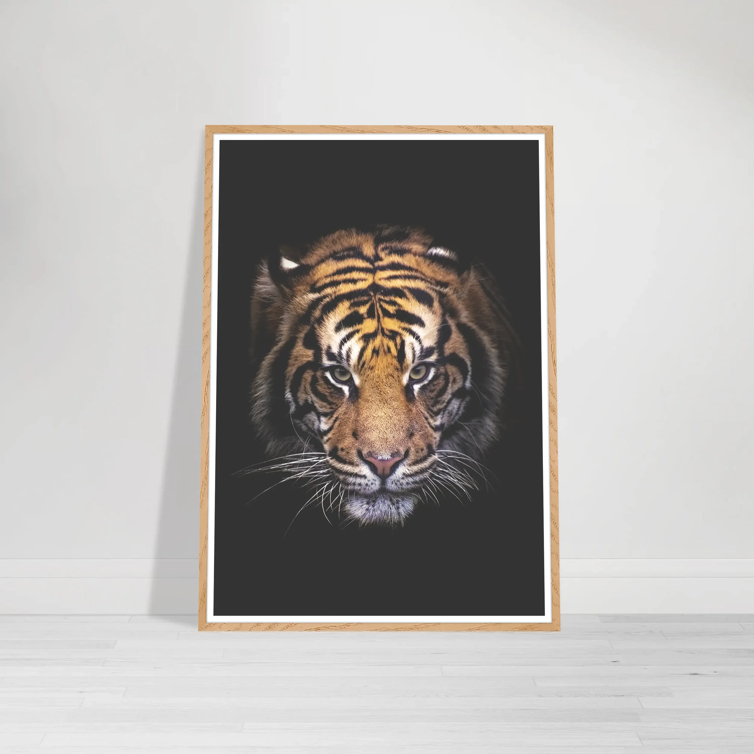 'Tiger' print in a natural wood frame, adding an earthy, organic warmth that reflects the tiger’s natural habitat and untamed spirit.