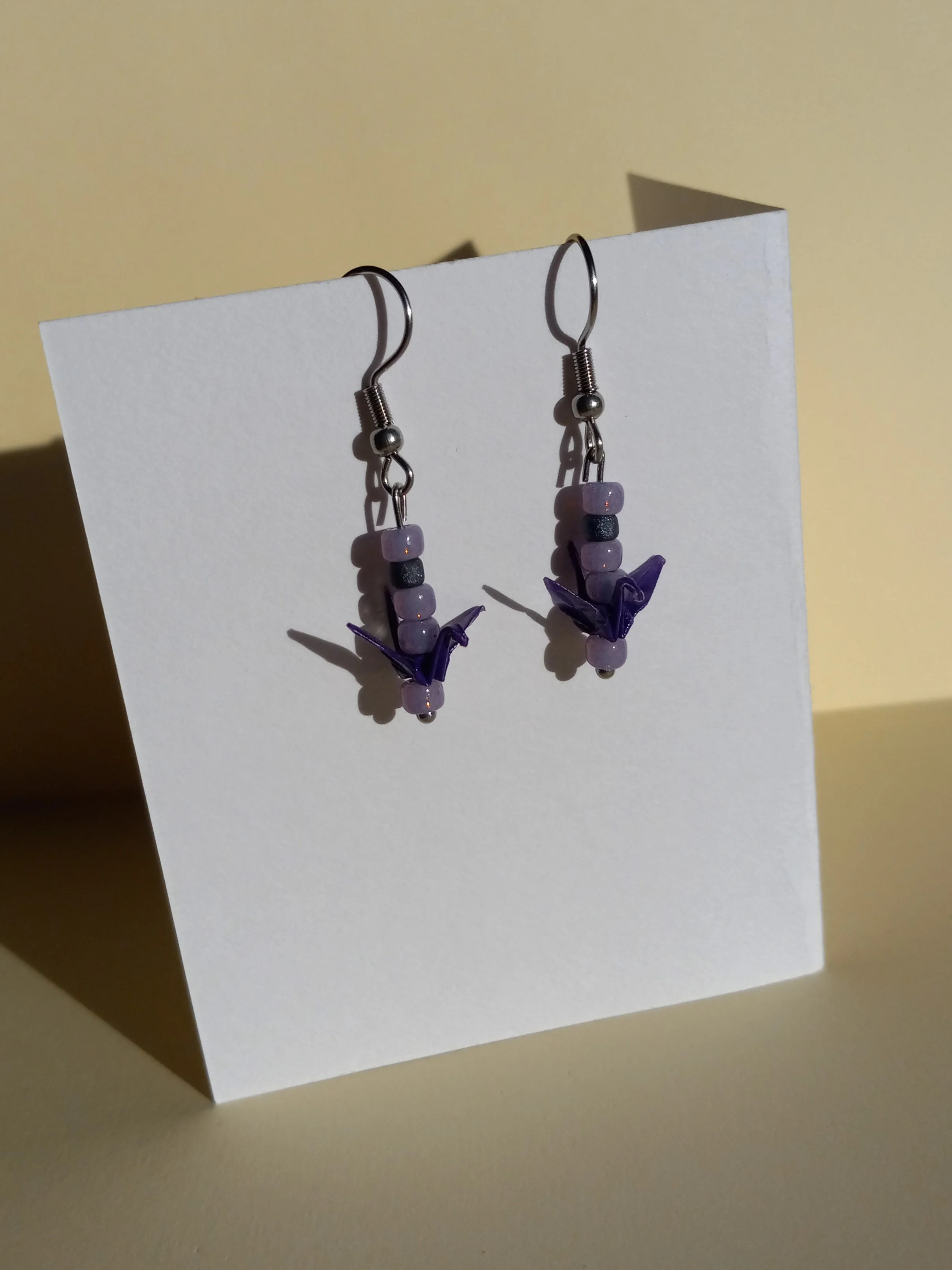 lacquered paper origami earrings by oddmothgoblin