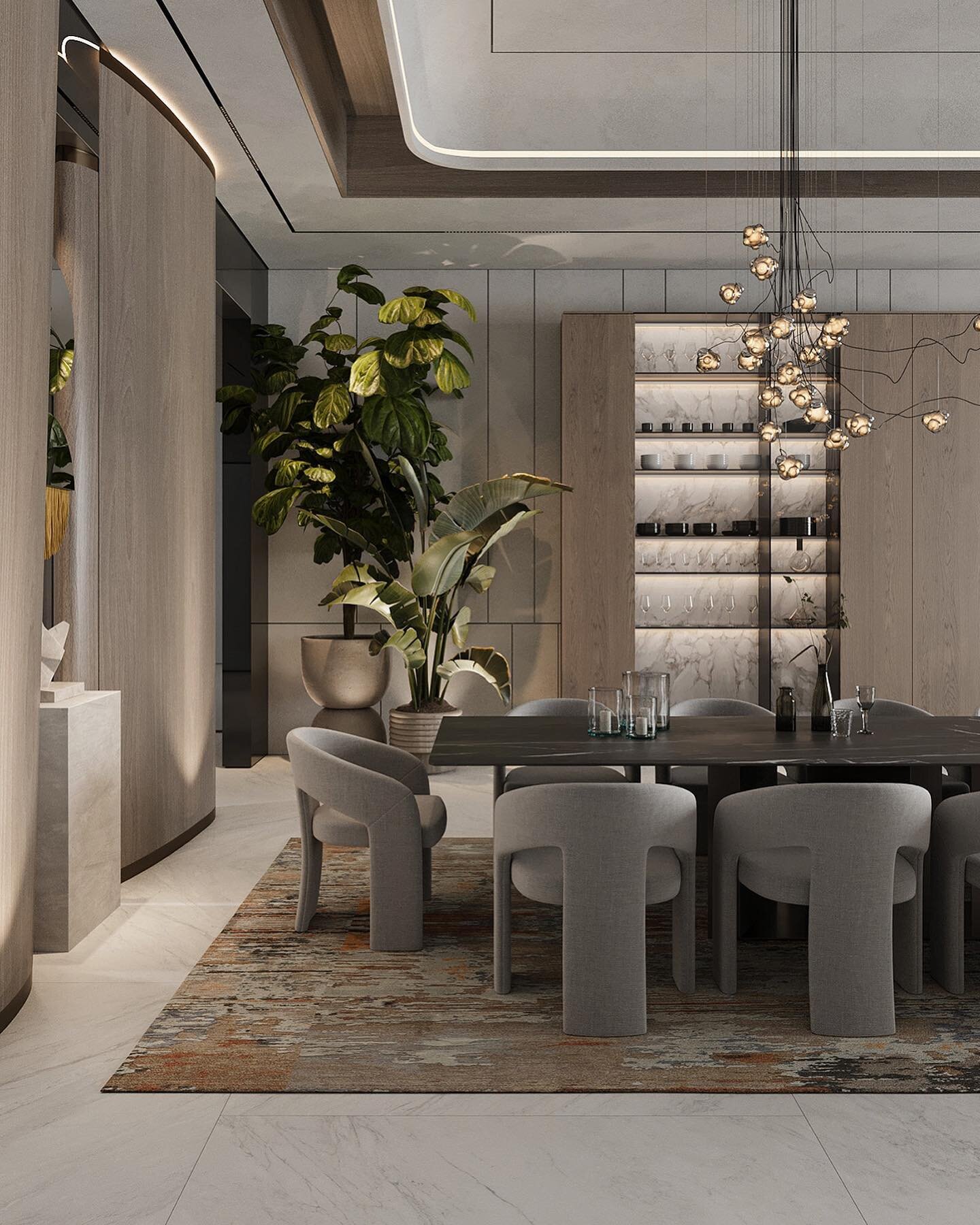 Enter the enchanting world of luxury decor within this remarkable home, crafted by the genius of NK Interiors. In the dining room, a crisp and sophisticated ambiance envelops you with elegant gray and warm beige tones.

Imagine gray dining chairs for