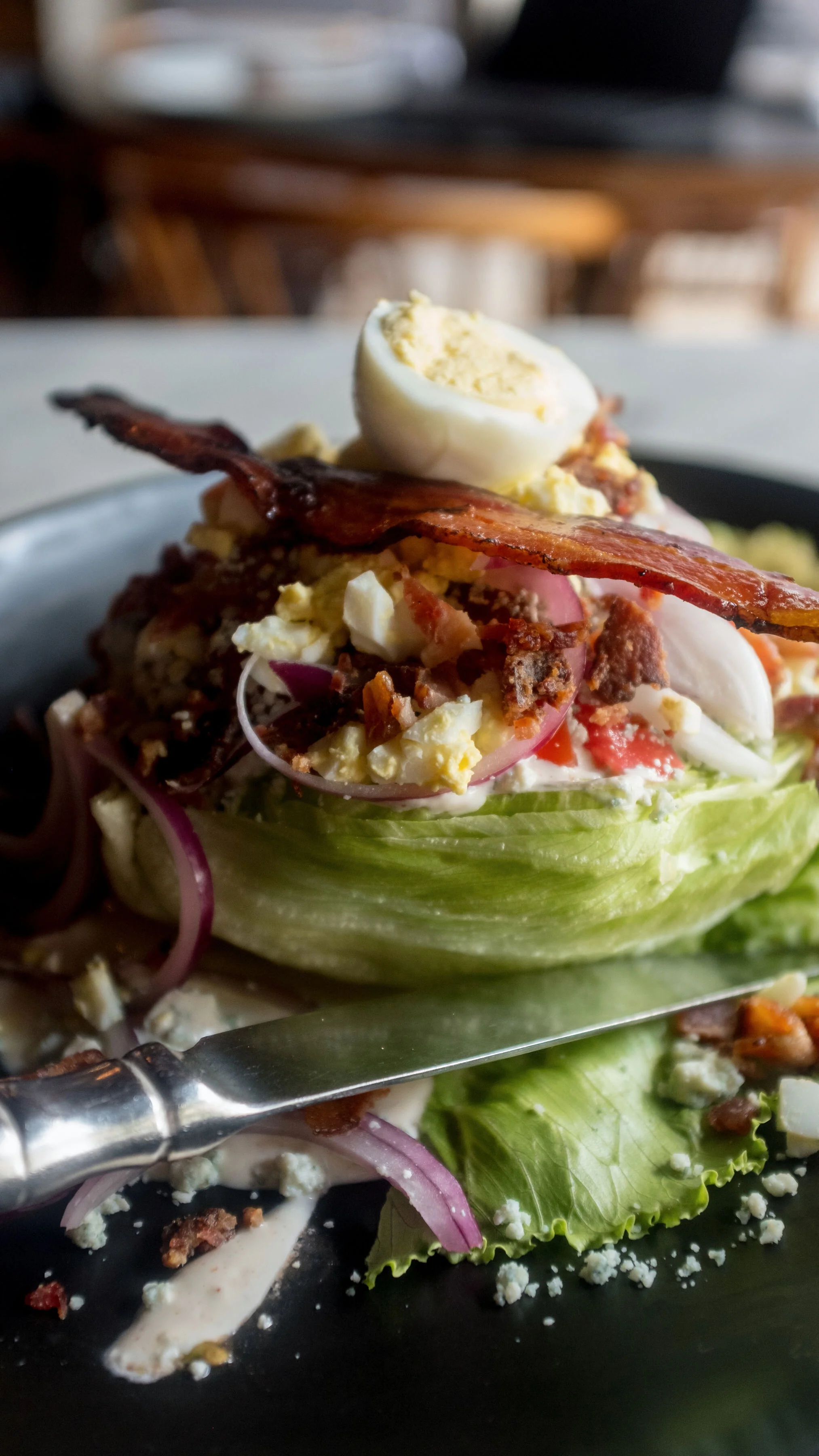 Wedge Salad | iceberg, tomato, avocado, egg, onion, Nueske’s bacon, blue cheese GF
