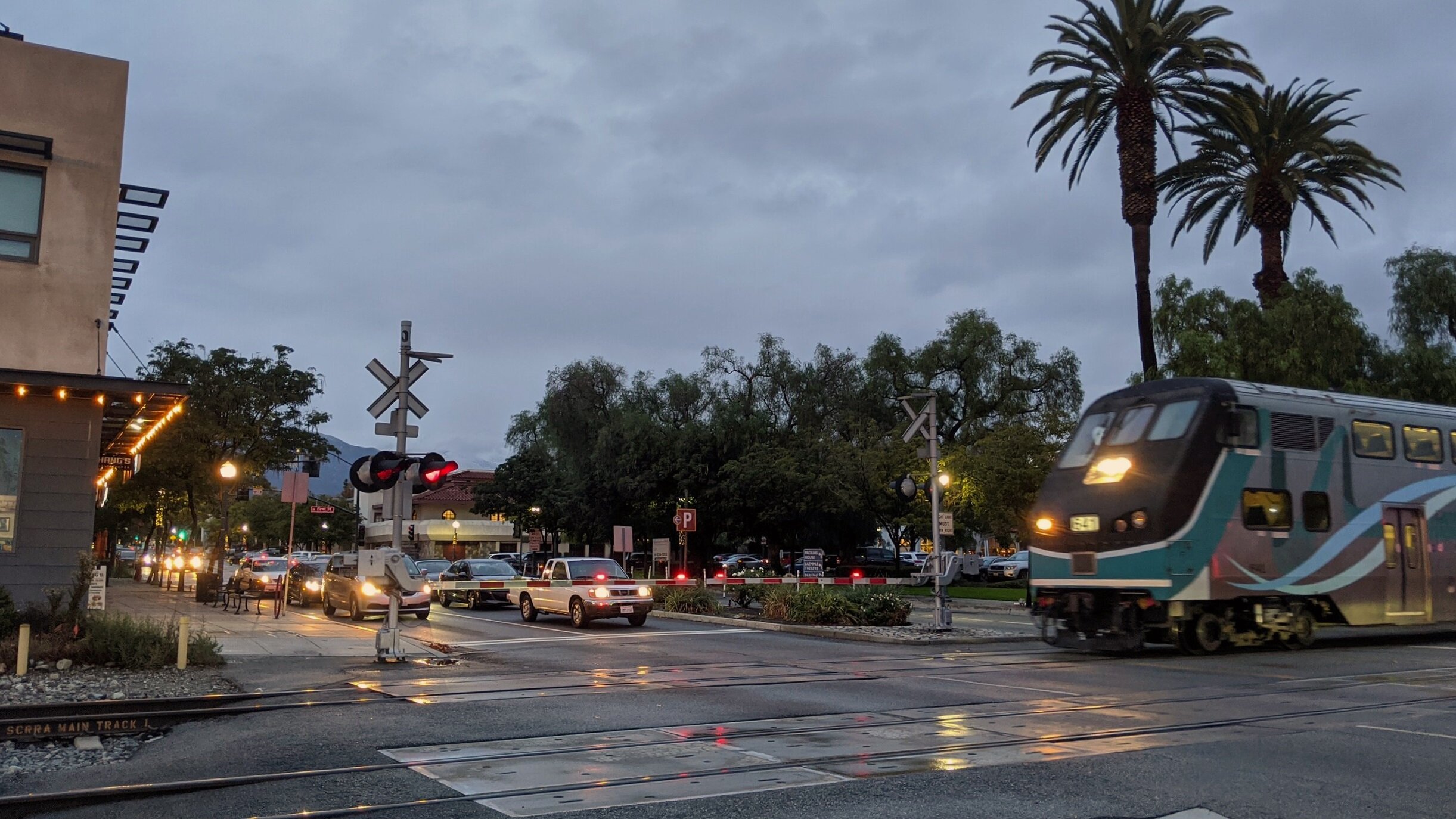 A westbound Metrolink train crosses Indian Hill Avenue in Claremont, CA. Photo by Alex Lewis, 2019.  