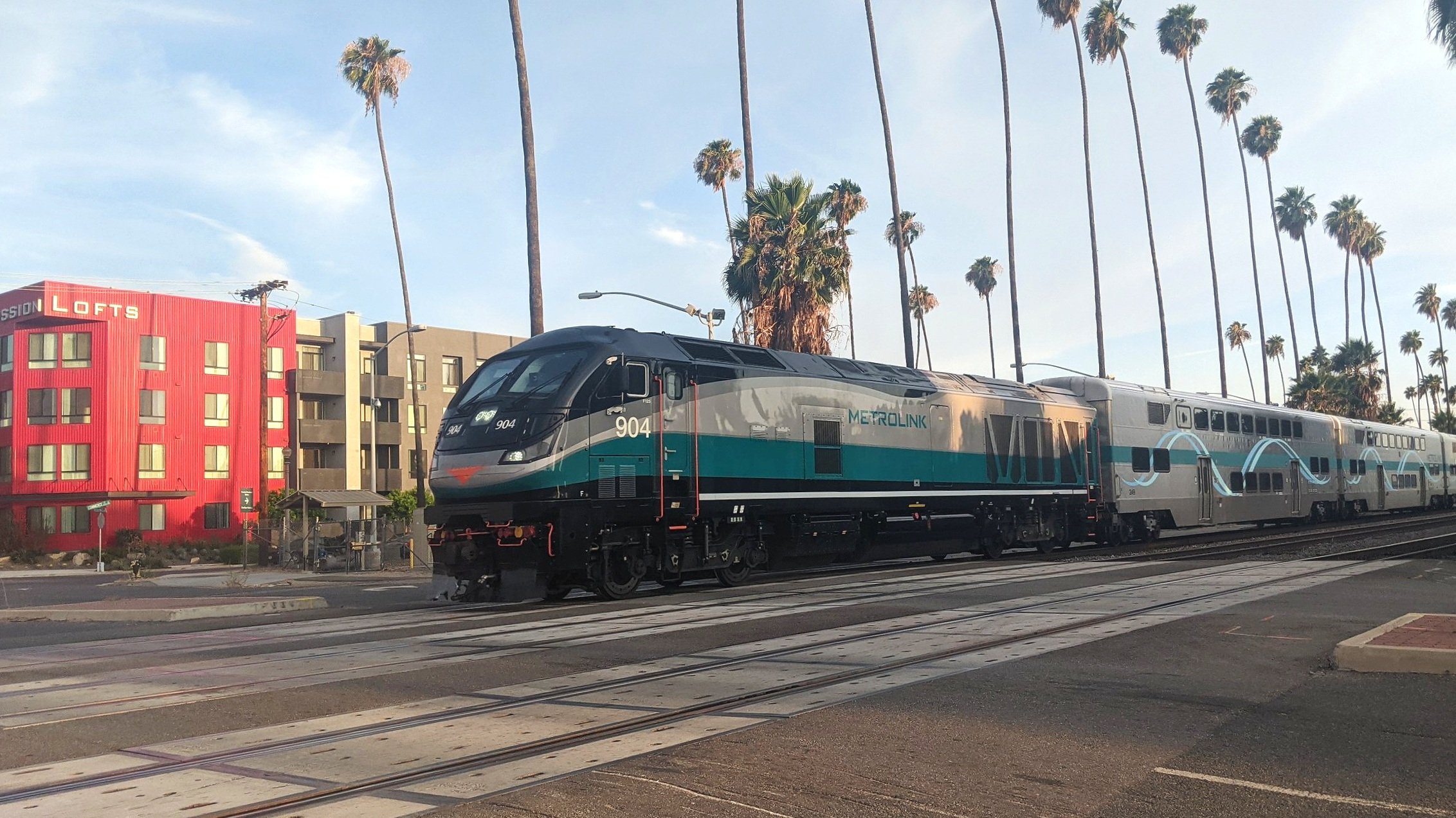  One of Metrolink’s Tier 4 locomotives crossing Mission Inn Drive in Riverside, CA. Photo by Alex Lewis, 2022.  