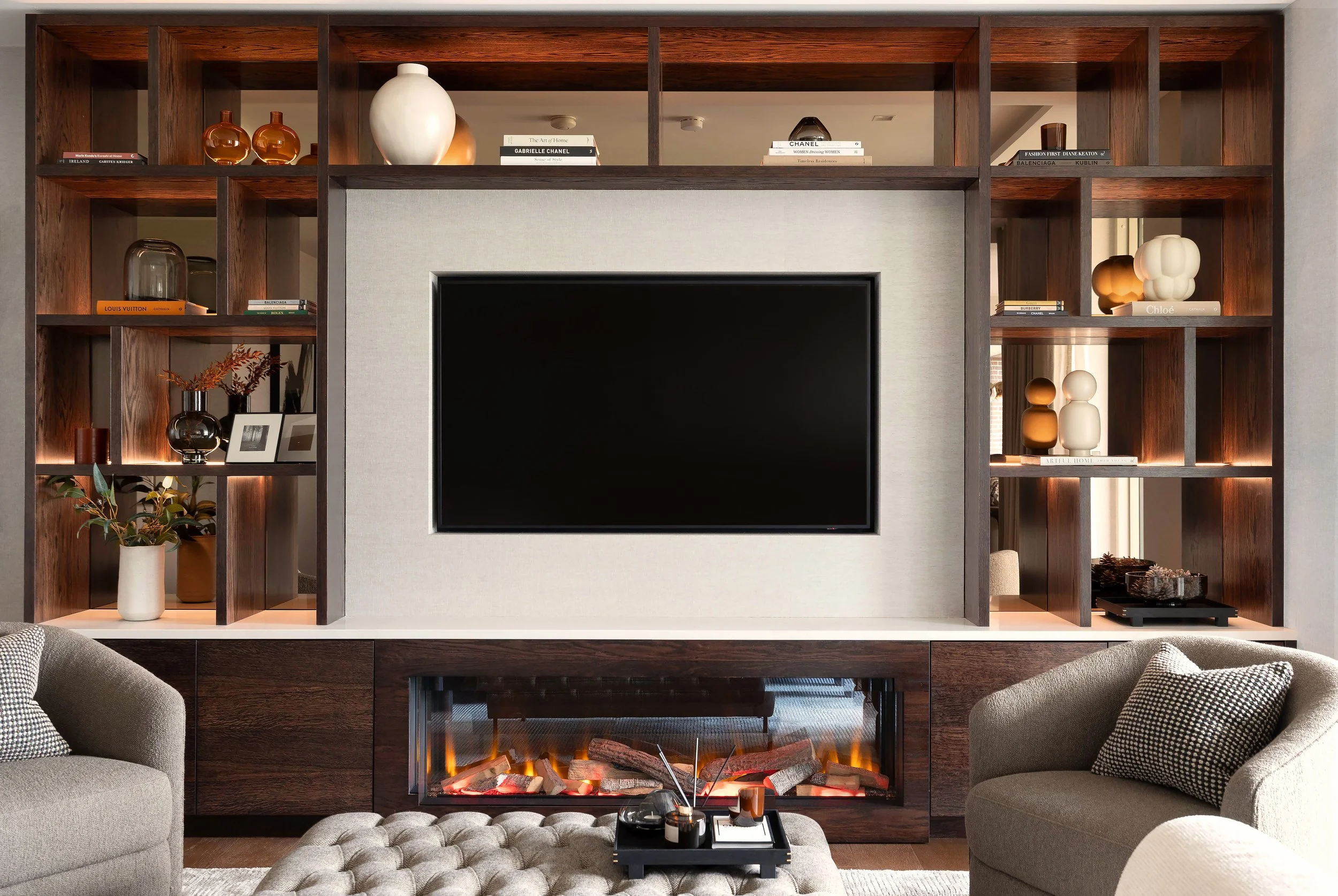Sittingroom in Ballsbridge with fire, shelves and tv