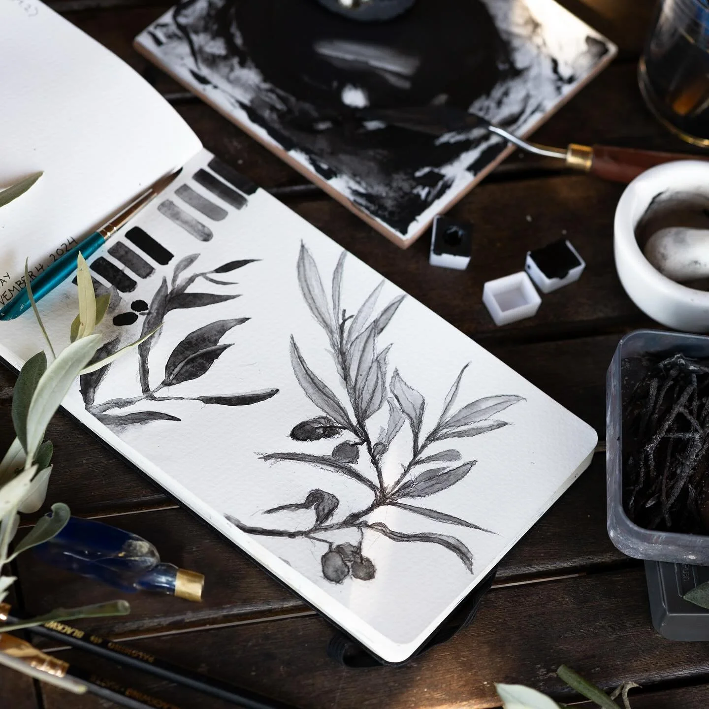 PANICALE DAY 15 // IN WHICH WE CONTEMPLATE OLIVES PT 2
The olive leaves were cast in carbon, fine and brittle. The green wood had spit as it baked, raising tiny blisters on the twigs. I tilted the tin this way and that, admiring the tremors of irides