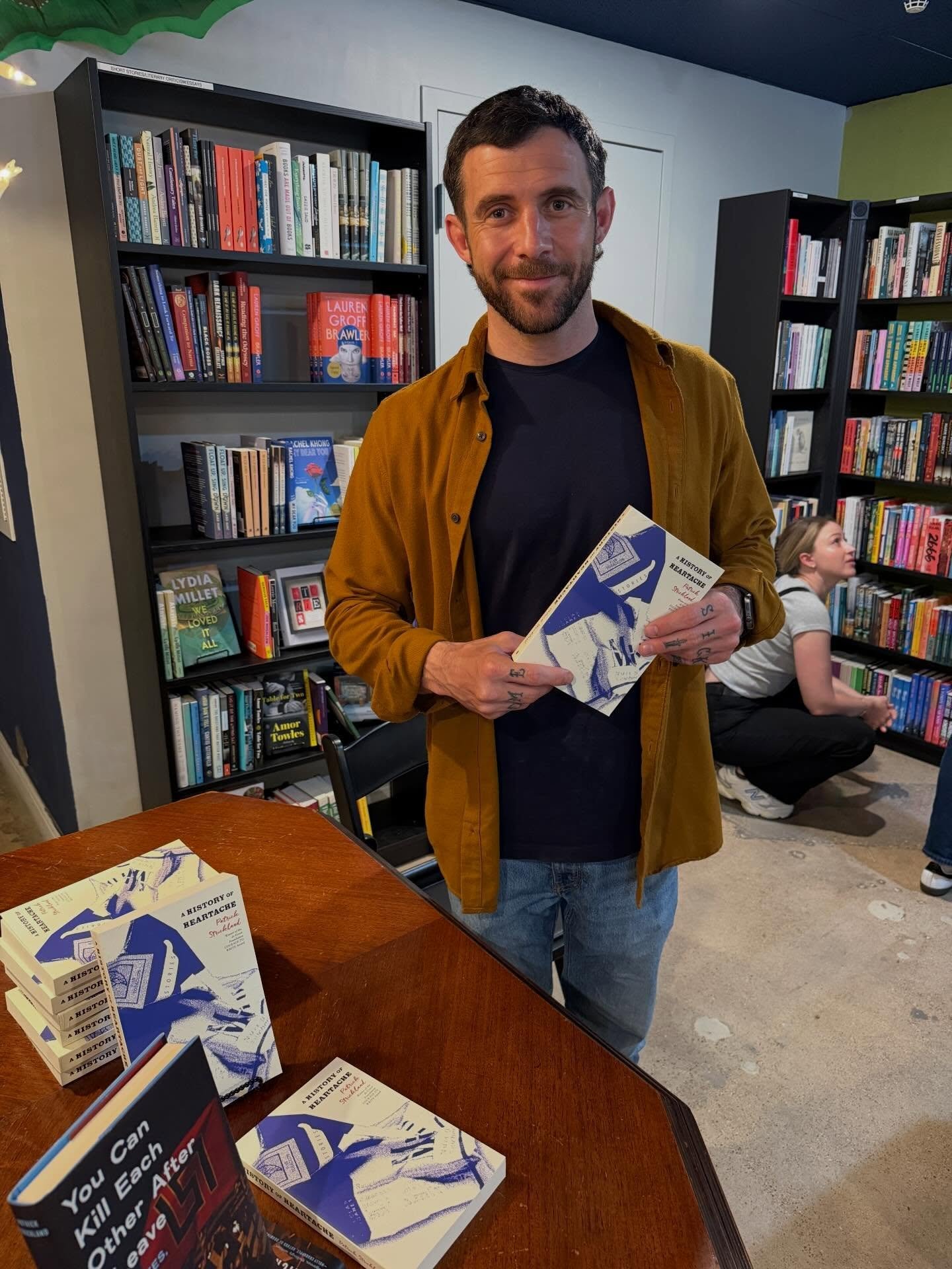#Indiebookstoreday is in full swing here at the shop! Author @patrickstricklandjournalist is here and ready to sign copies of his book, A History of Heartache. Stop by, meet the author, and get a signed book!