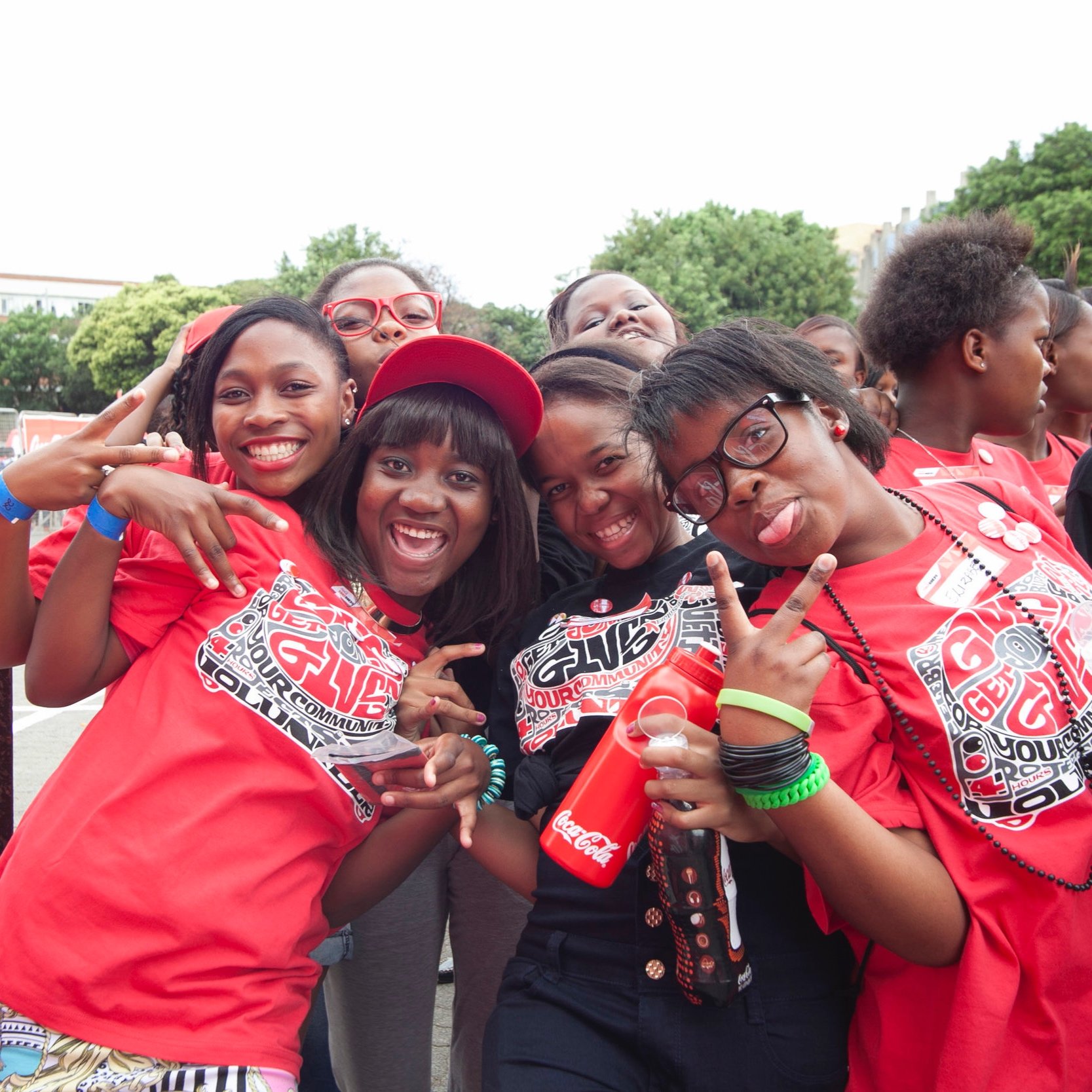 Posed-Volunteers-Give-To-Get-Coke2