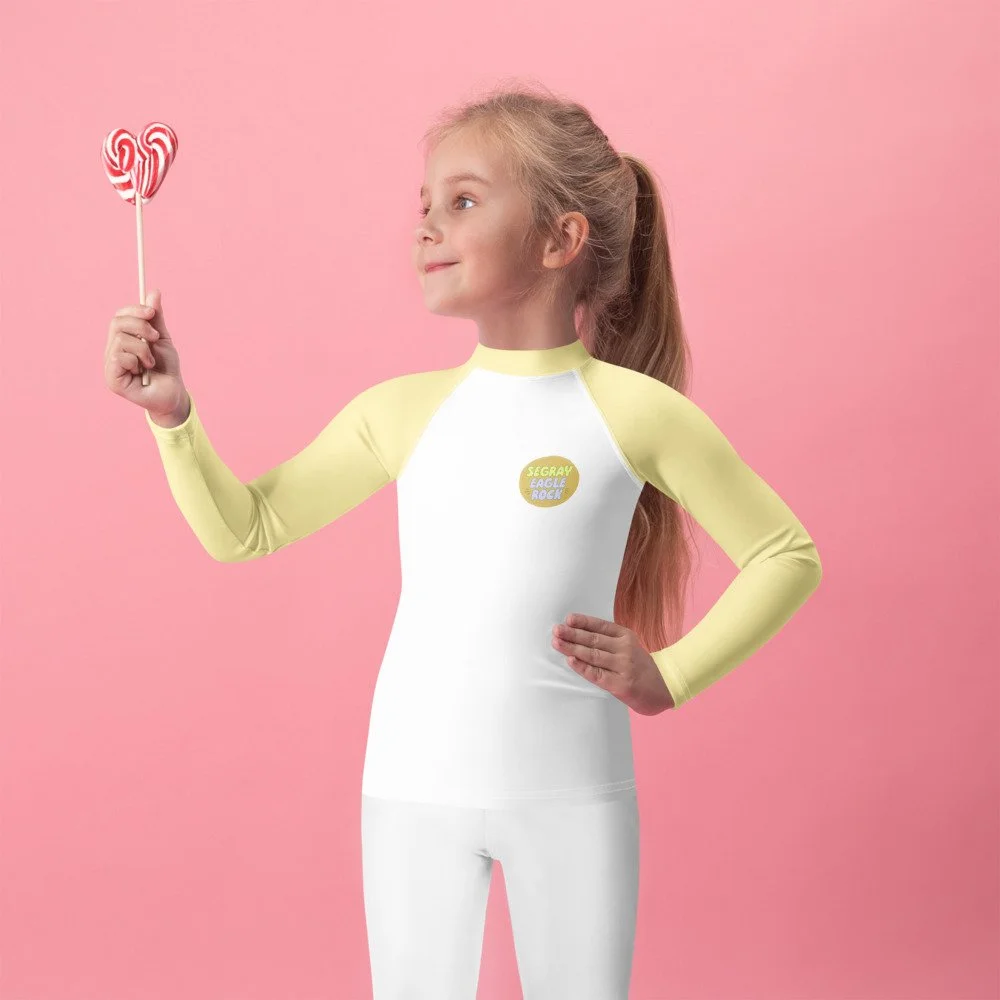 all-over-print-kids-rash-guard-white-front-6a878d8d0633d.jpg