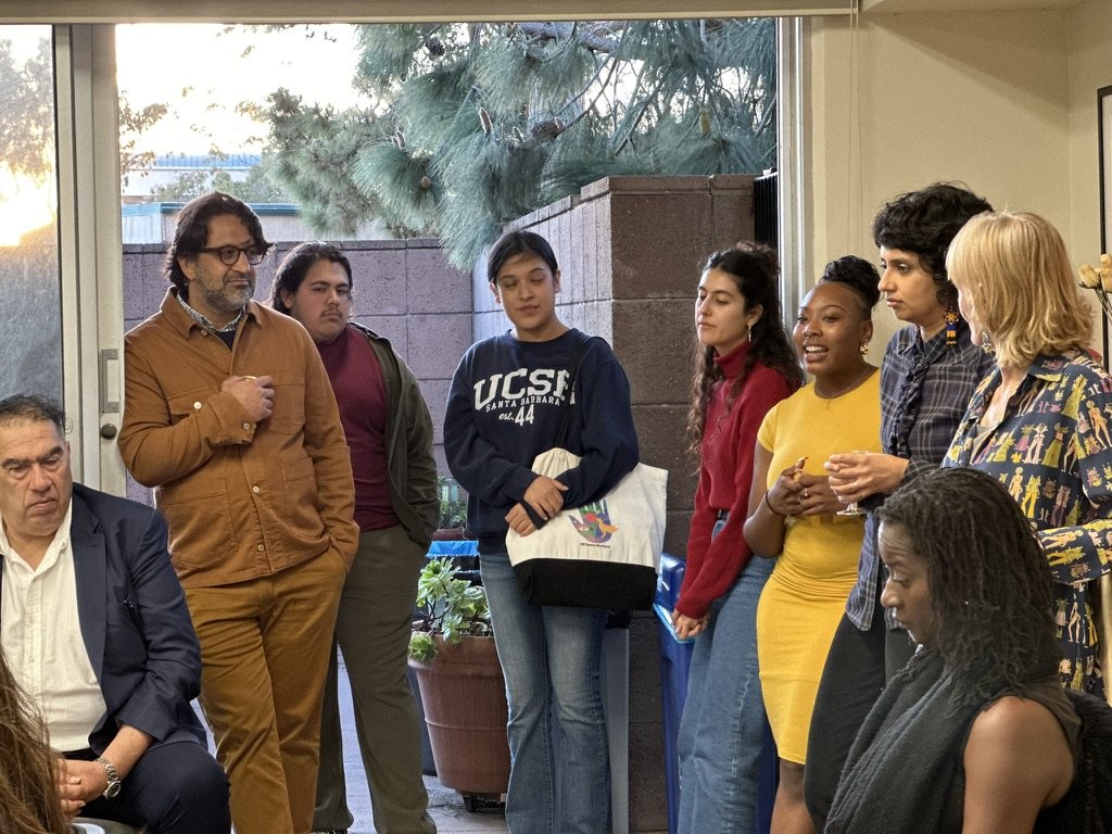 Faculty and grad students at Sandra Cisneros' welcoming reception  