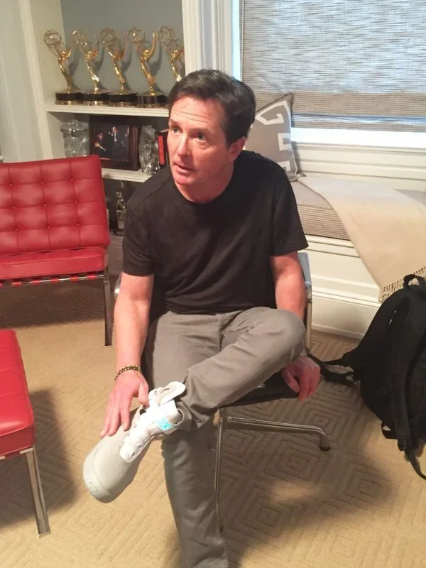 Michael J Fox tries on REAL Nike Air Mag Self Lacing Shoes for the FIRST TIME! His reaction is priceless! 