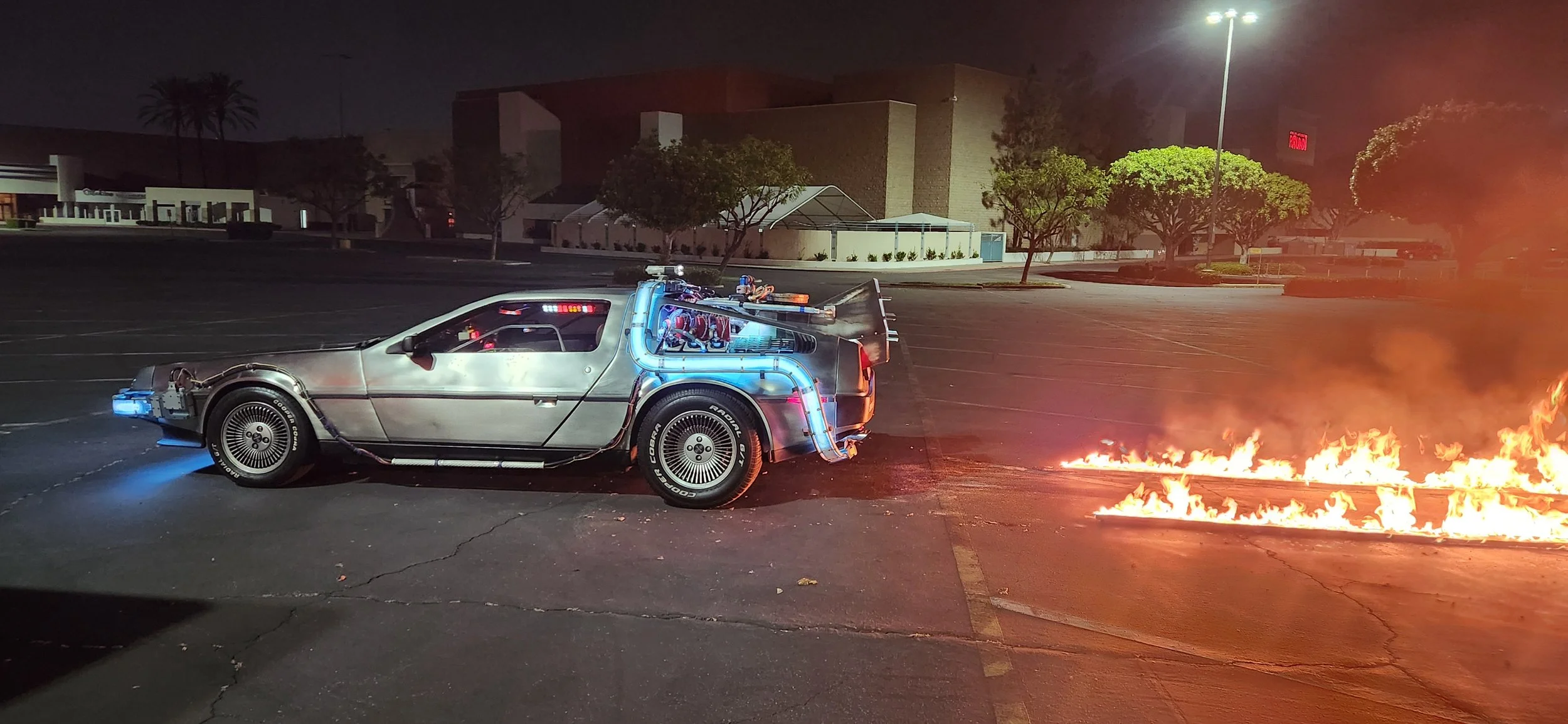 Back to the Future scene recreated at the real Twin Pines Mall.... with fire trails!