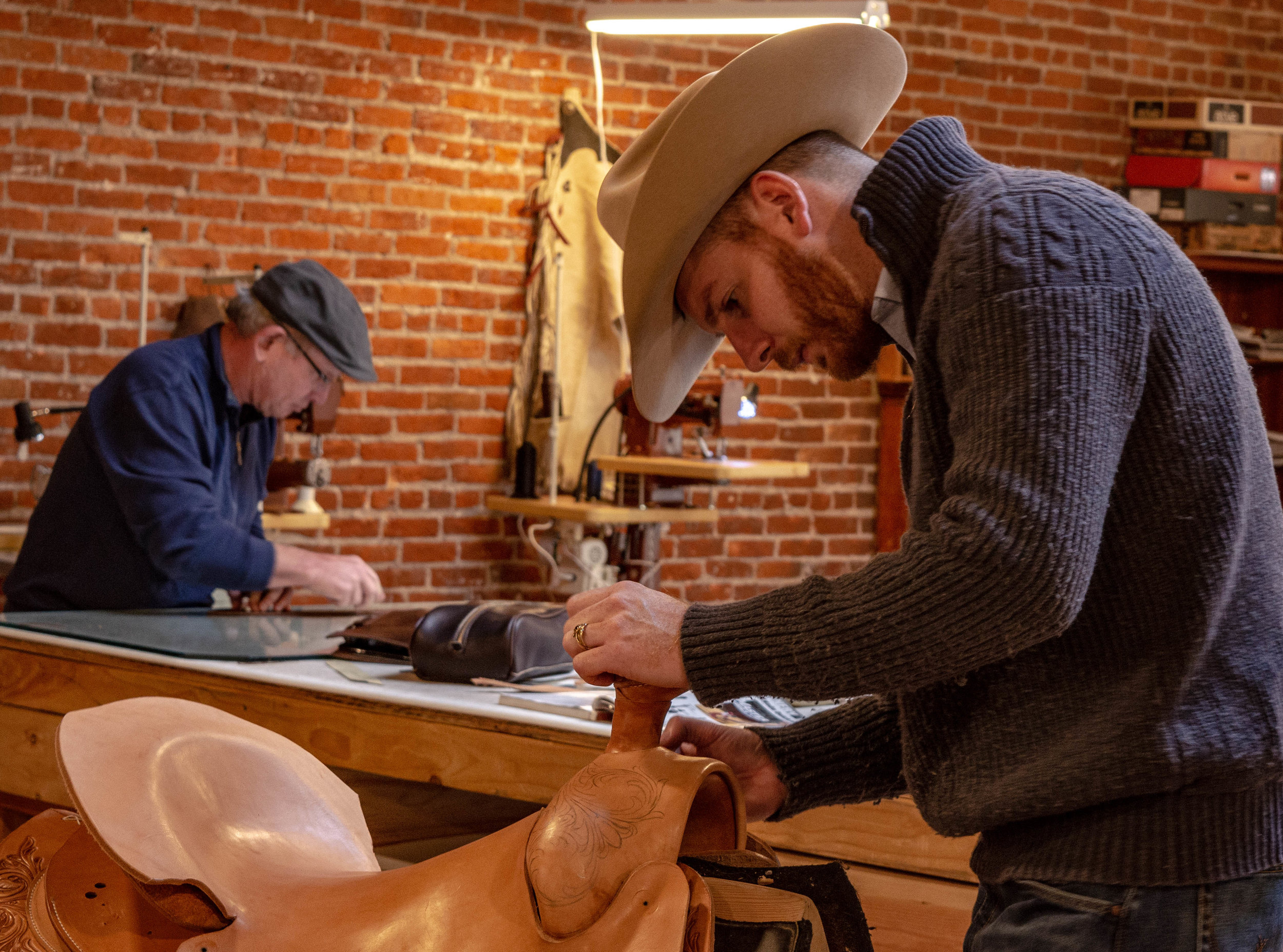 Tim builds a saddle in his Burns, Oregon leather shop
