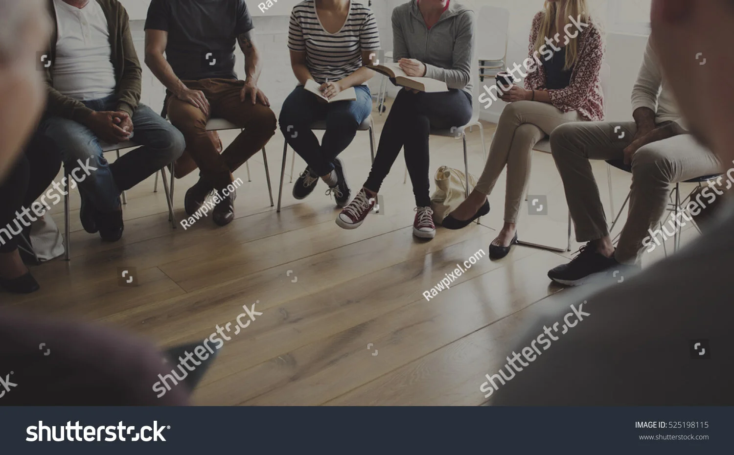 stock-photo-people-sitting-in-a-circle-counseling-525198115.jpg