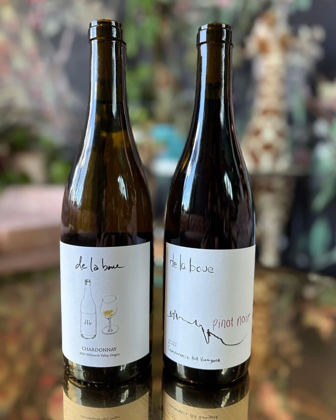 😋 Nothing gets us singing Oooh-La-La more than real good Oregon wine. 
De La Boue (from the earth) is Travis Todd's new organically farmed wine label from the Willamette Valley. A wine &amp; hospitality industry vet, Travis turned his attention to f