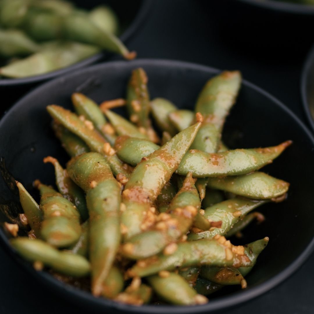 Garlic Edamame | Happy Hour Menu at The Village Inn