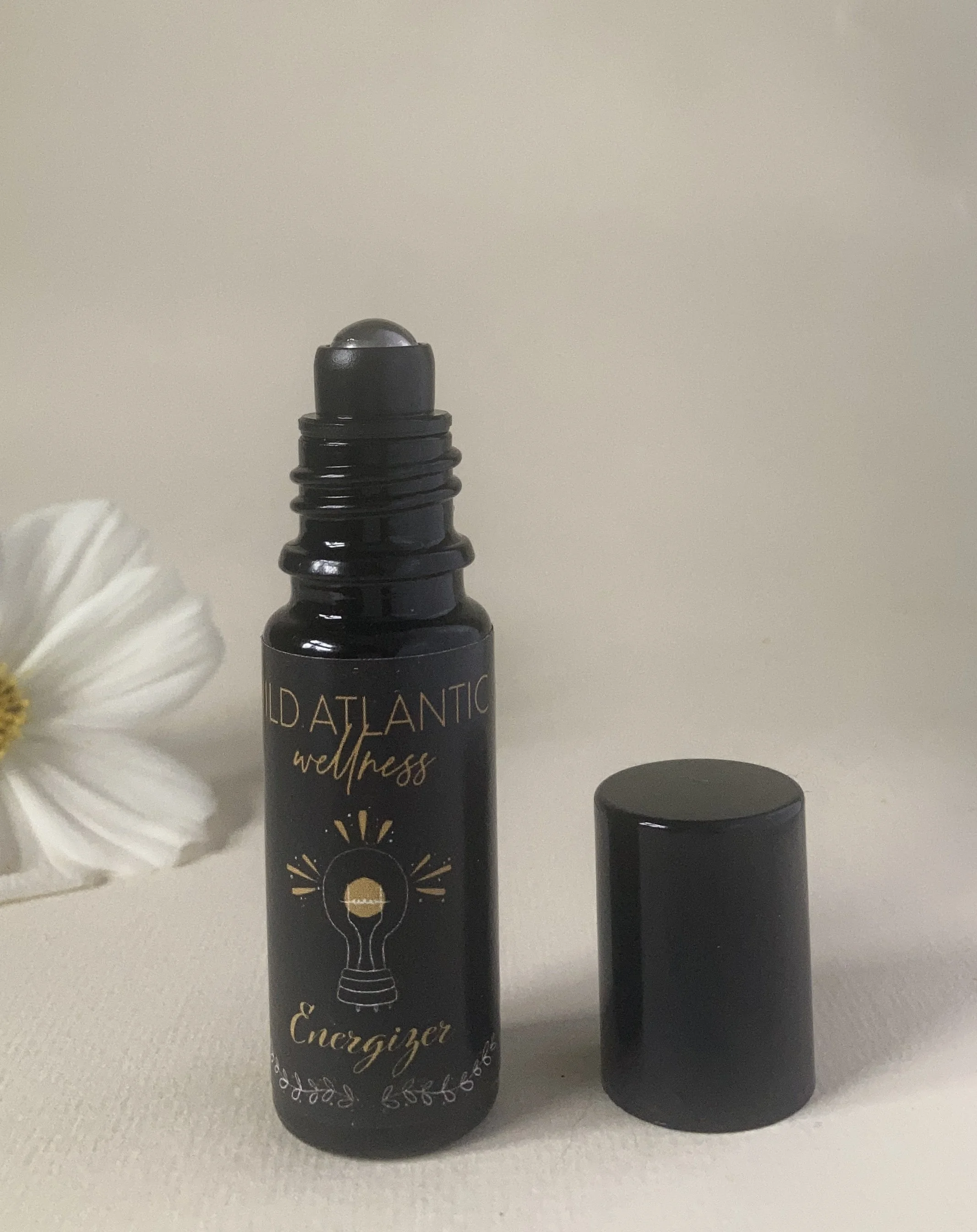 Energizer uplifting essential oil roller blend by Wild Atlantic Wellness — natural energy boost roller with peppermint wild orange and rosemary handmade in West Cork Ireland