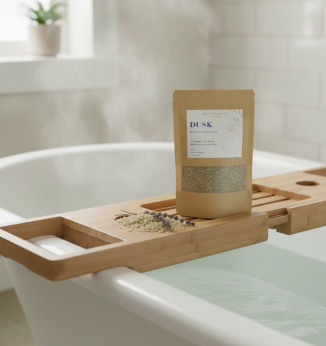 DUSK mineral bath soak on bathtub caddy, relaxing sleep bath ritual