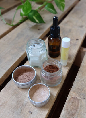 My  Dirty Hippie Cosmetics  refillable aluminium tins alongside my other simple beauty products I refill myself!  Cacao bronzer , jojoba oil refilled at Biome and my super-simple  two-ingredient everything-balm .