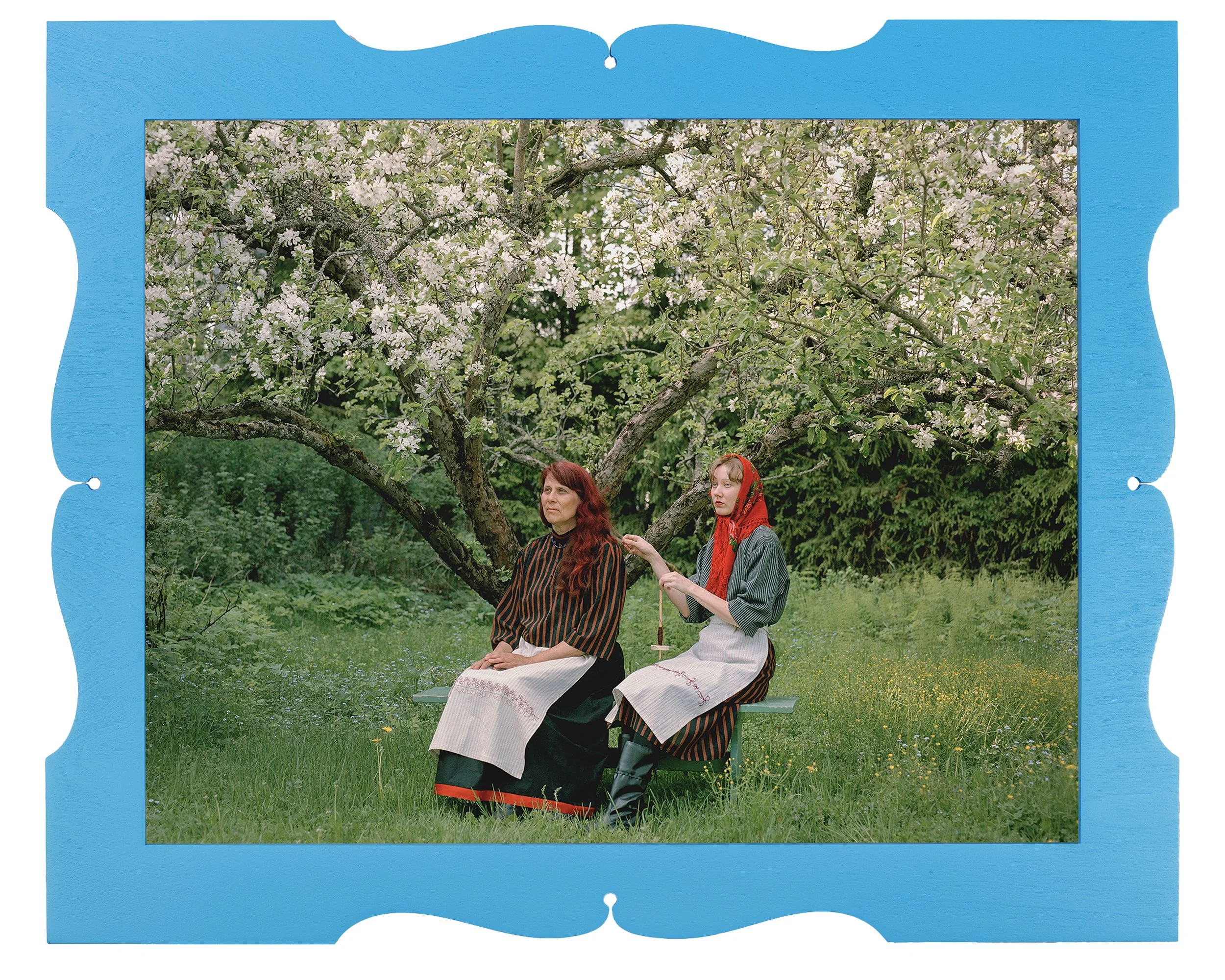  Lumi Tuomi.  Kezriäjy . Kehrääjä/Spinner. 2024. Decorative wooden frame, museum glass, pigment print on Dibond. 62 x 50,5 cm. 