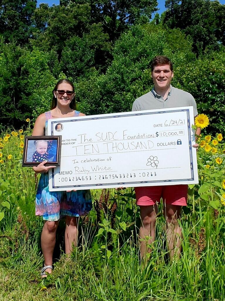   Our $10,000 grant to the SUDC Foundation for the work they do in research and family support in honor of Ruby White.  Donations that supported this effort were made in honor of:     Sofia Garbe     Lincoln Meeks     Jonathan "JJ" Day     Armin Rafi