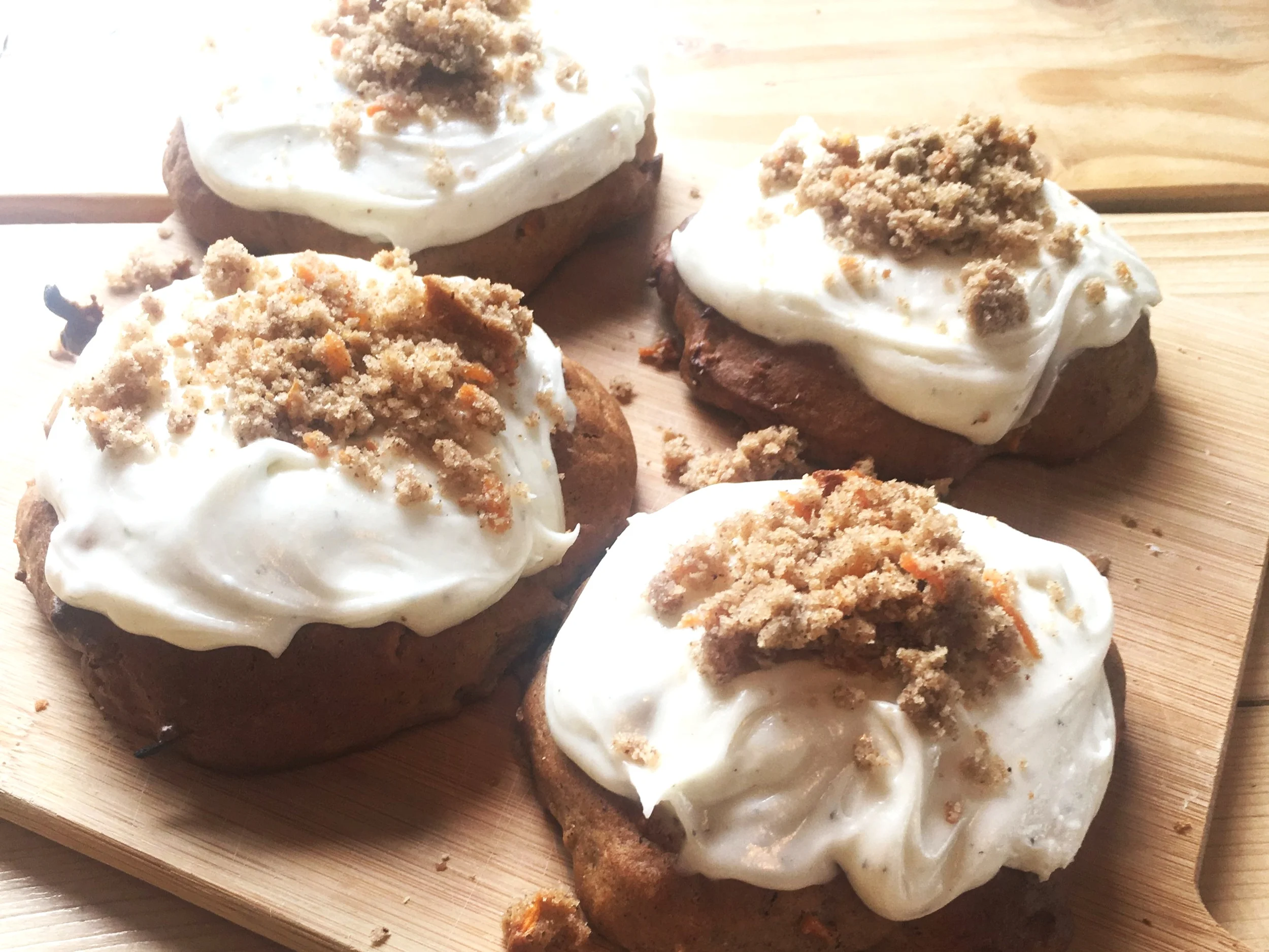 Filled carrot cake donuts with cream cheese frosting