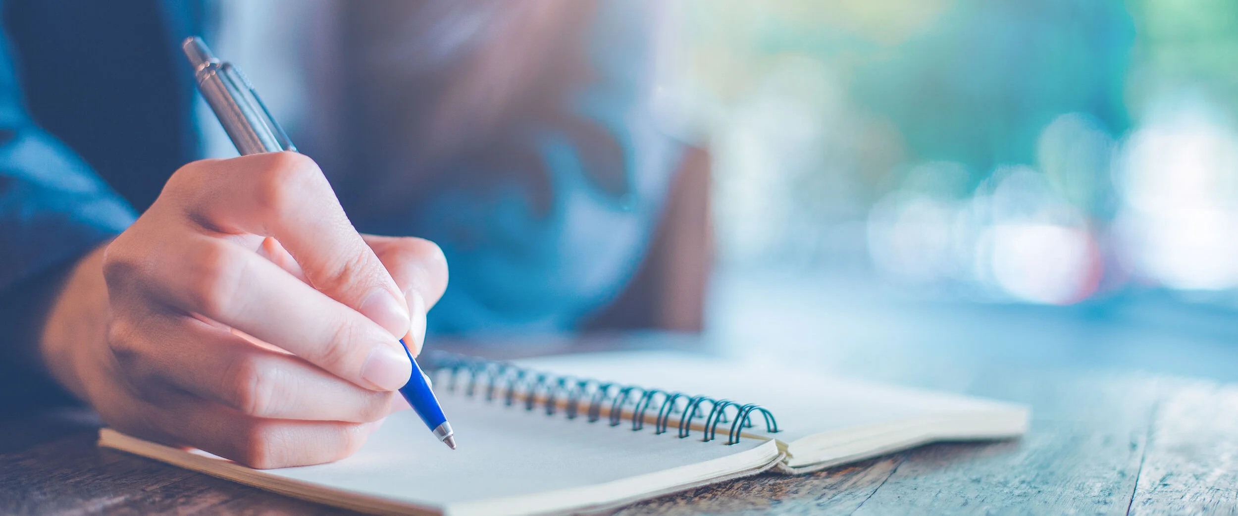 Hope-Therapy-Center-Blog-banner-womans-hand-writing-in-notebook.jpg