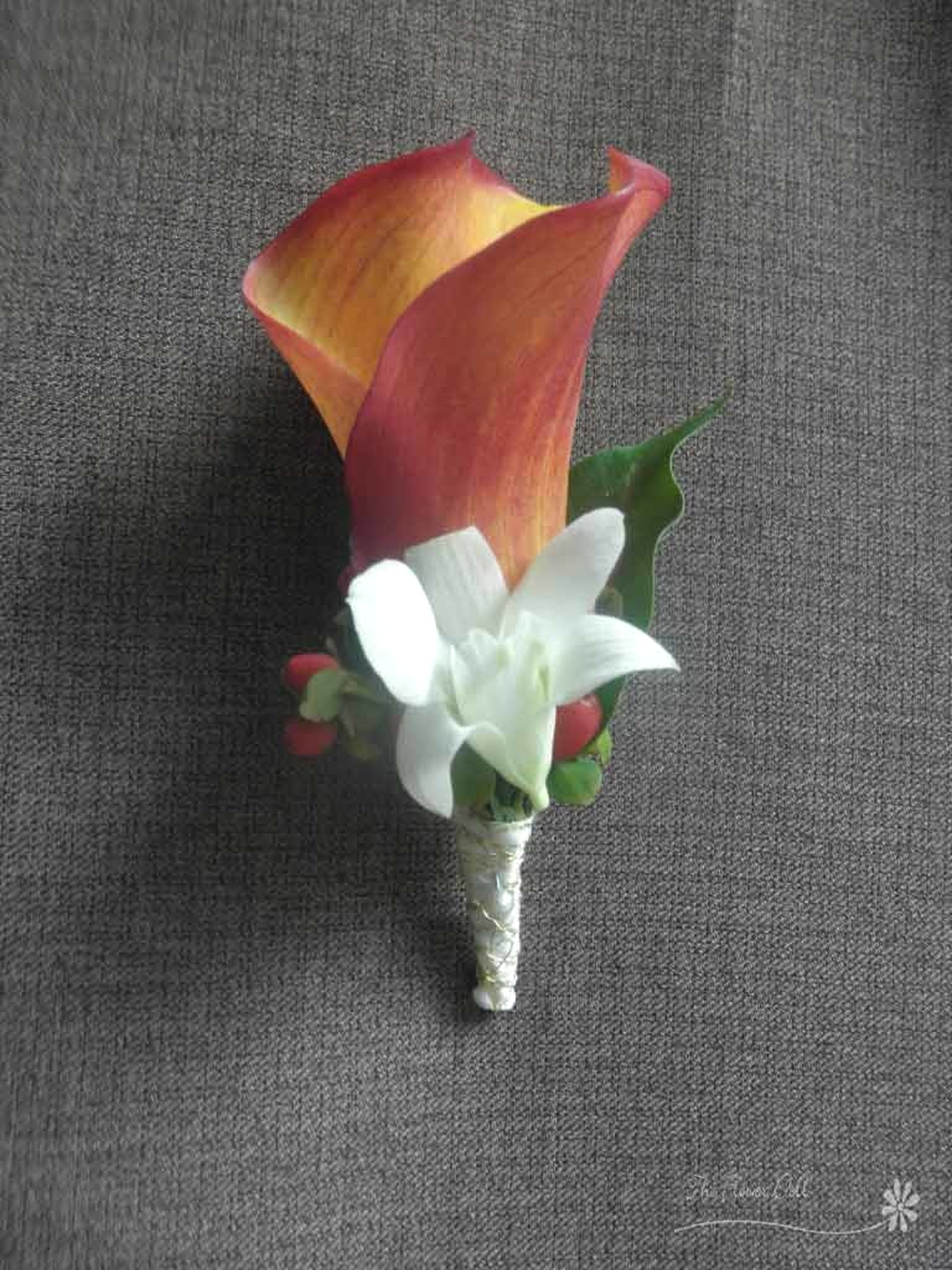 Boutonniere Calla and orchid.jpg
