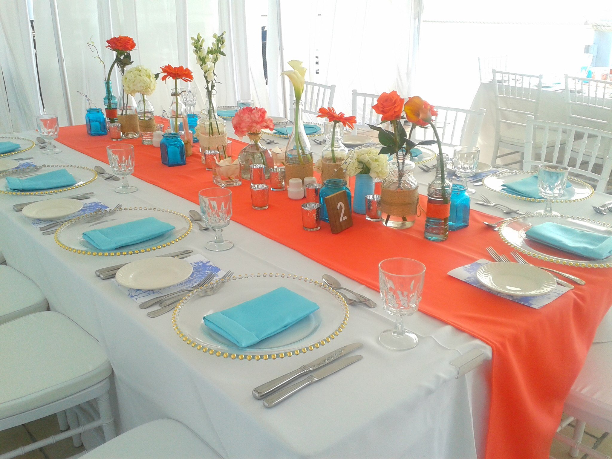 Eclectic-mix-Coral-blue-table-flowers_Easy-Resize.com.jpg