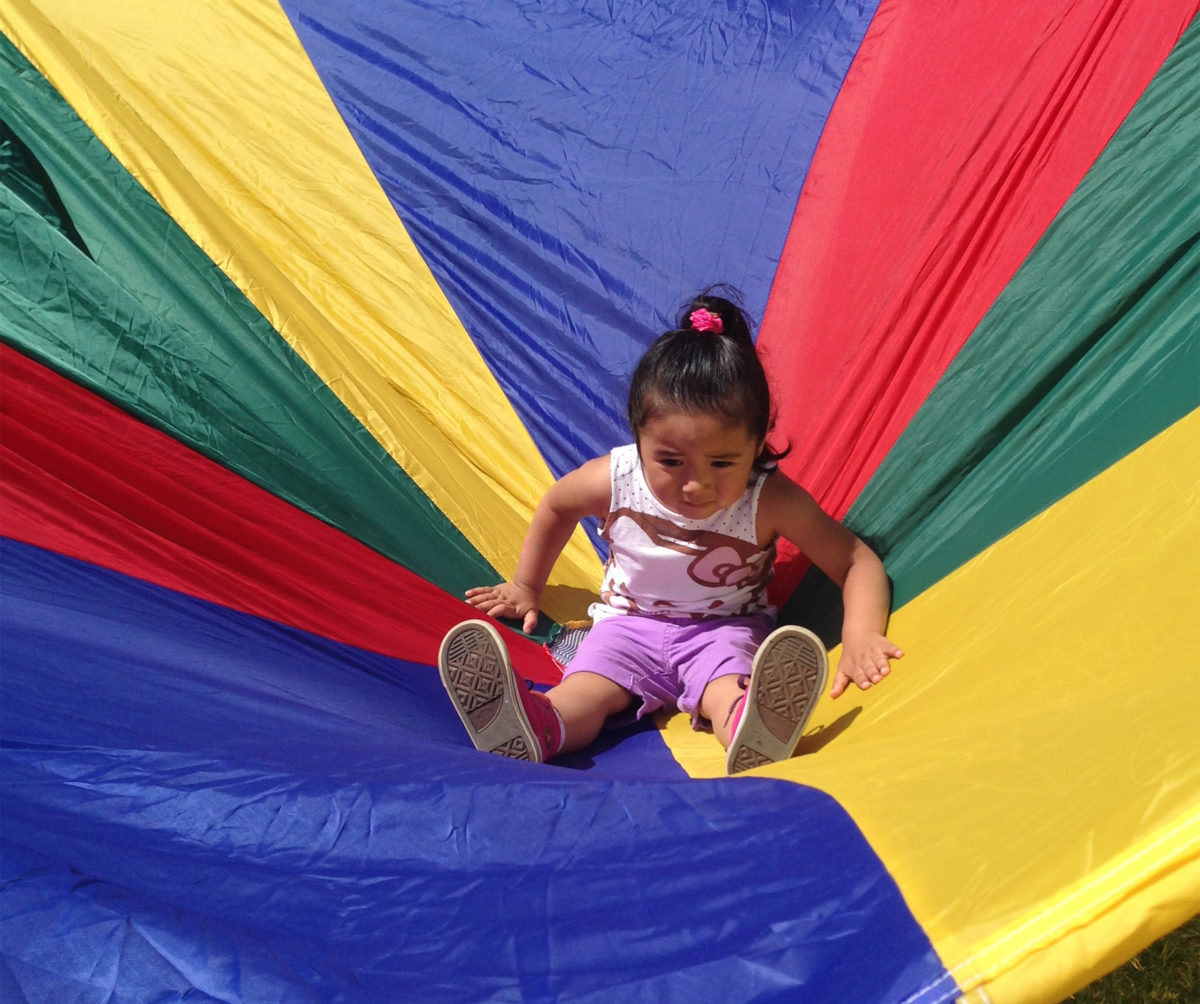 Girl playing with canopy