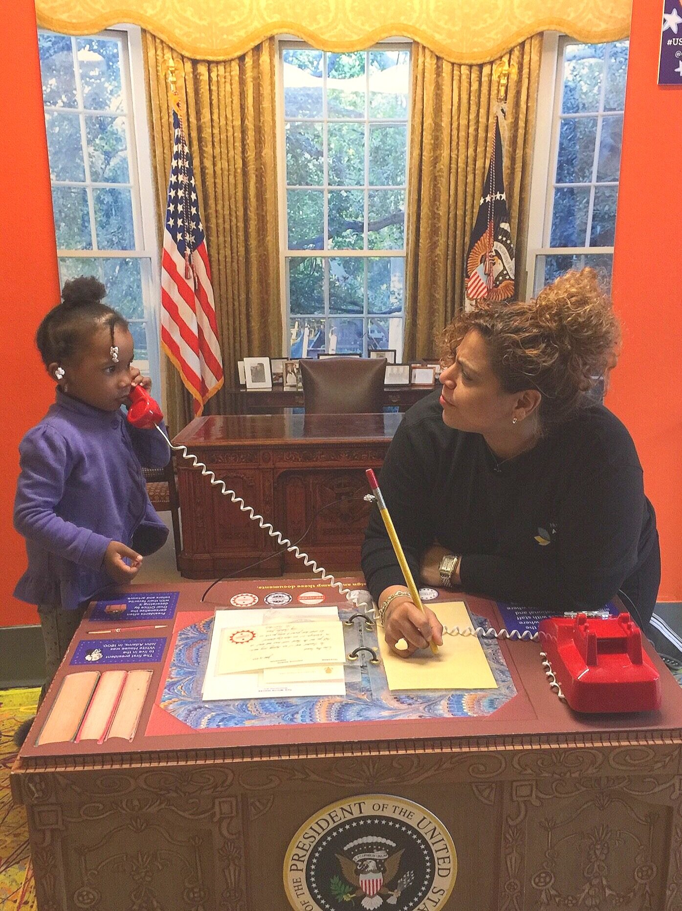 Child playing  in oval office 
