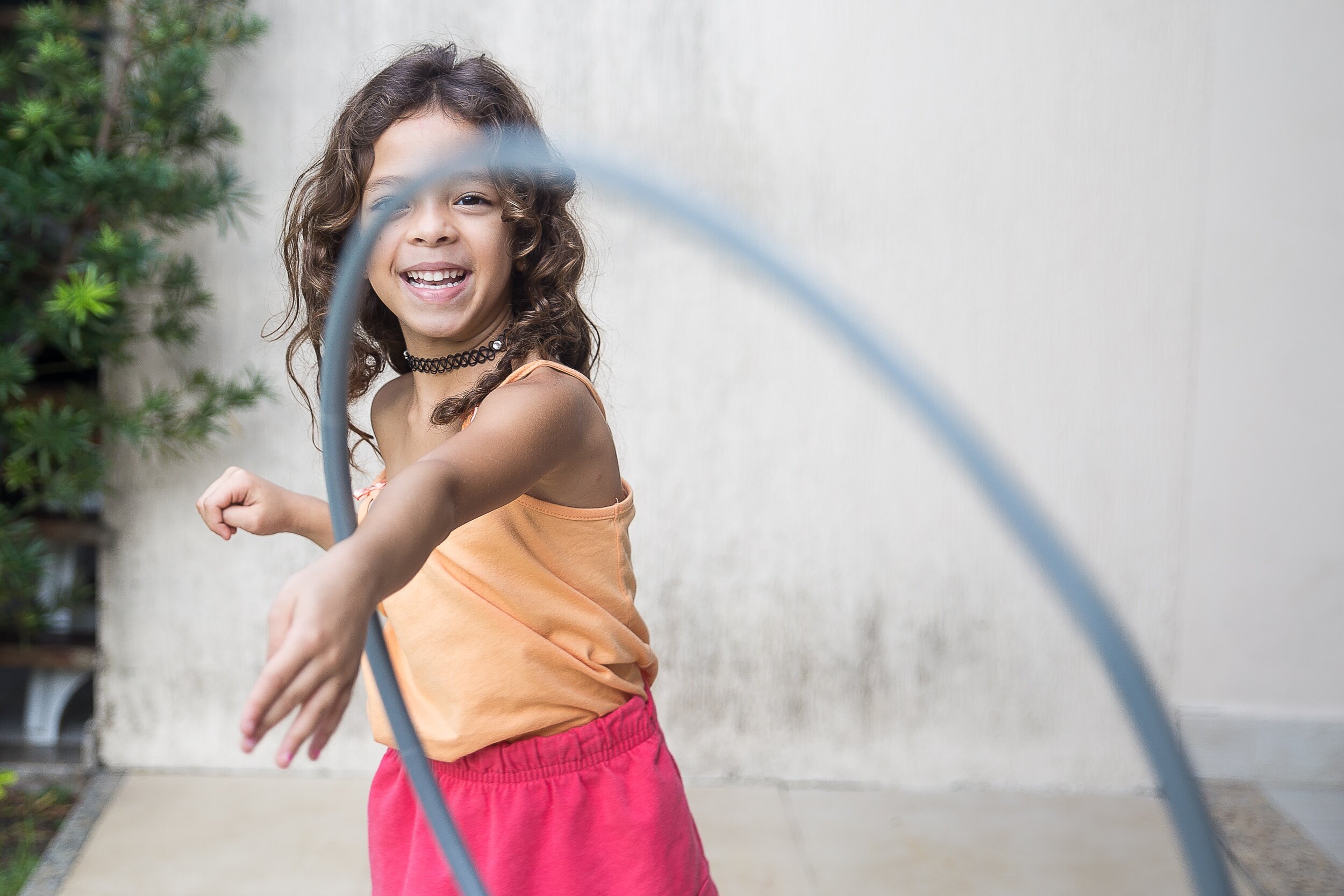 young girl outside playing