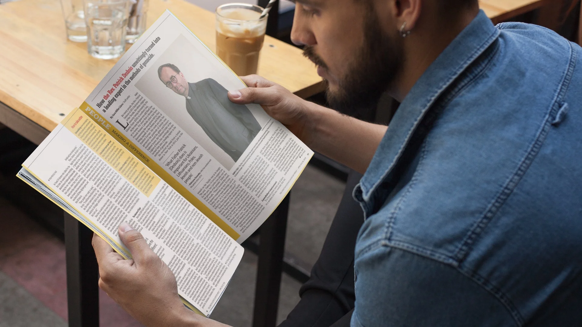 mockup-of-a-young-man-with-beard-reading-a-magazine-while-at-a-coffee-shop-a14444.jpg