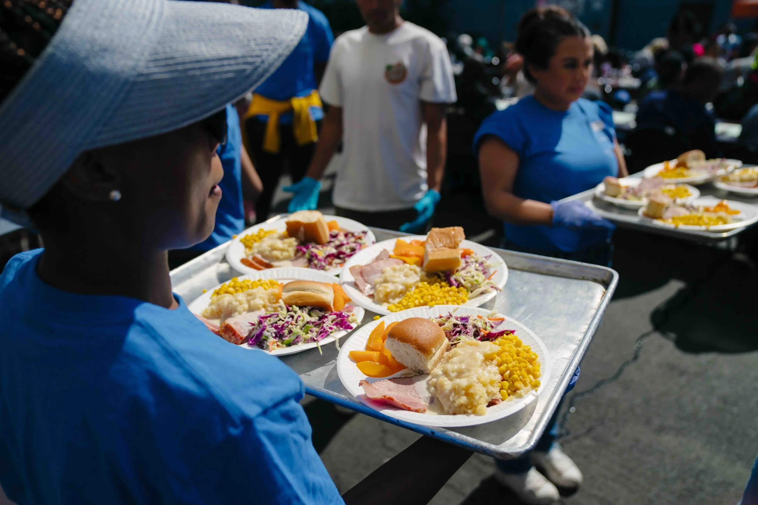 Volunteers serving meals