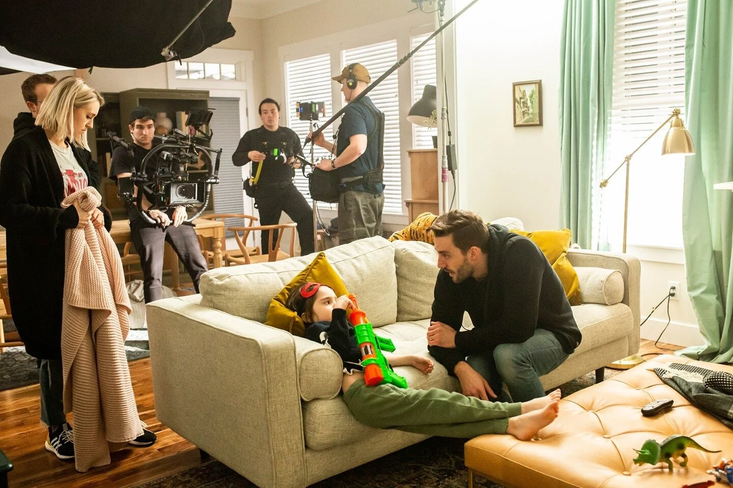 Director Eric Esau gives some notes to Elijah between takes. 1.9.2020 (Day 3/35)⁠
⁠
This was a really cool scene. We got to do that thing where you put haze in the air to get some play on the lightbeams coming through an open window, it was warm and 