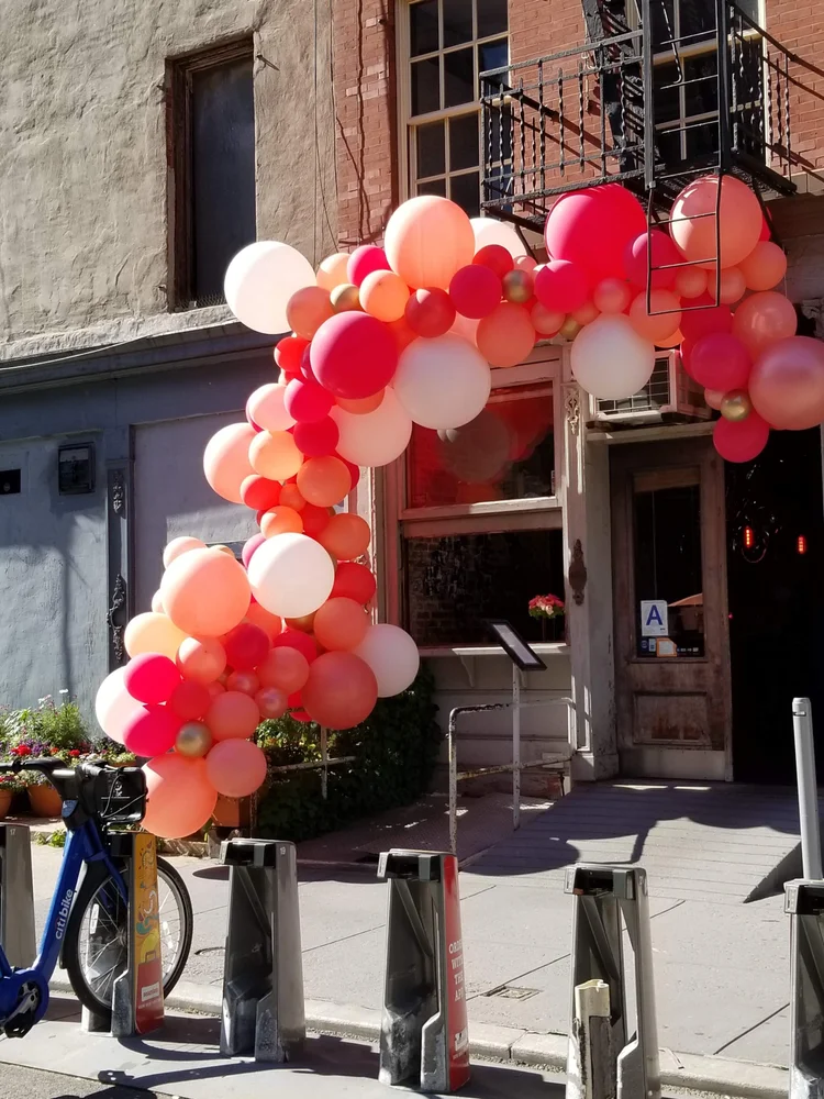 Balloon arch installation for an NYC event