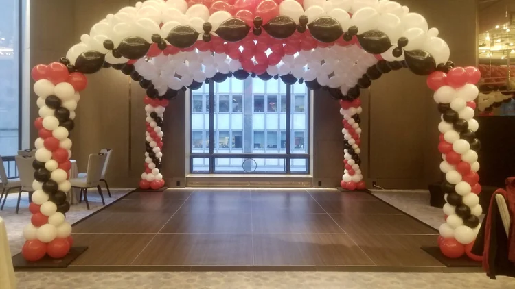 Organic balloon installation across a room NYC