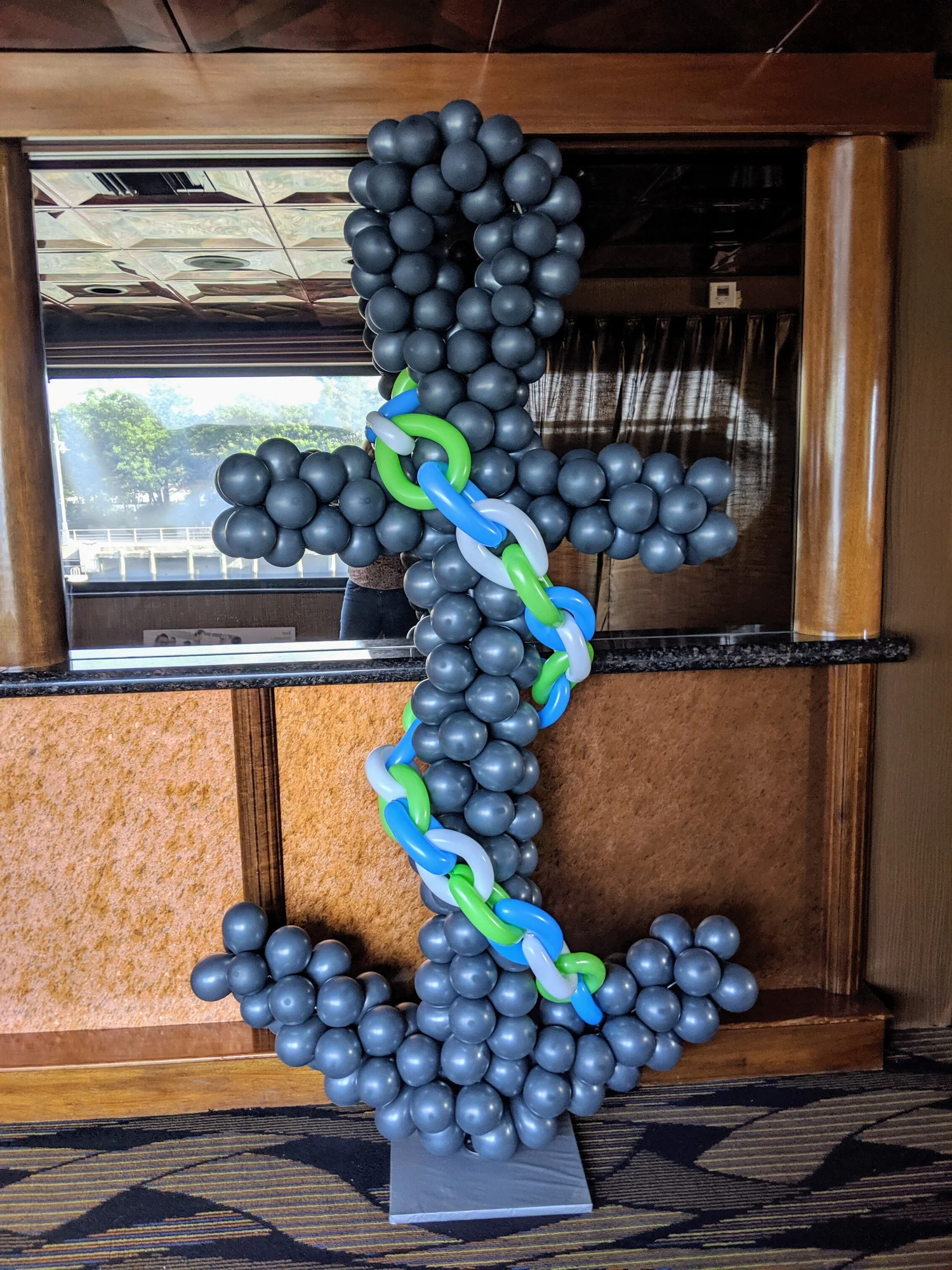 Balloon columns framing an event entrance in NYC