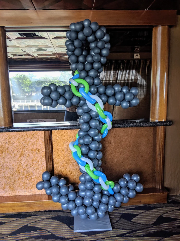 Balloon columns framing an event entrance NYC