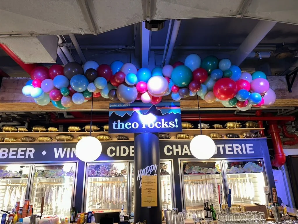 Ceiling-mounted organic garland in jewel tones.jpeg