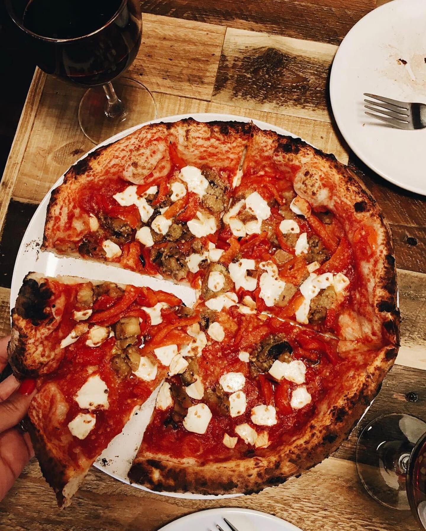 DATE NIGHT IDEA 🍕🍷 Dine-in @pupatellarva and enjoy appetizers, wood-fired pizza, and wine *chefs kiss* Pictured here is the Eggplant &amp; Red Pepper: grilled eggplant, roasted red pepper, and fresh provola (smoked mozzarella) 👌&nbsp;Personally, w
