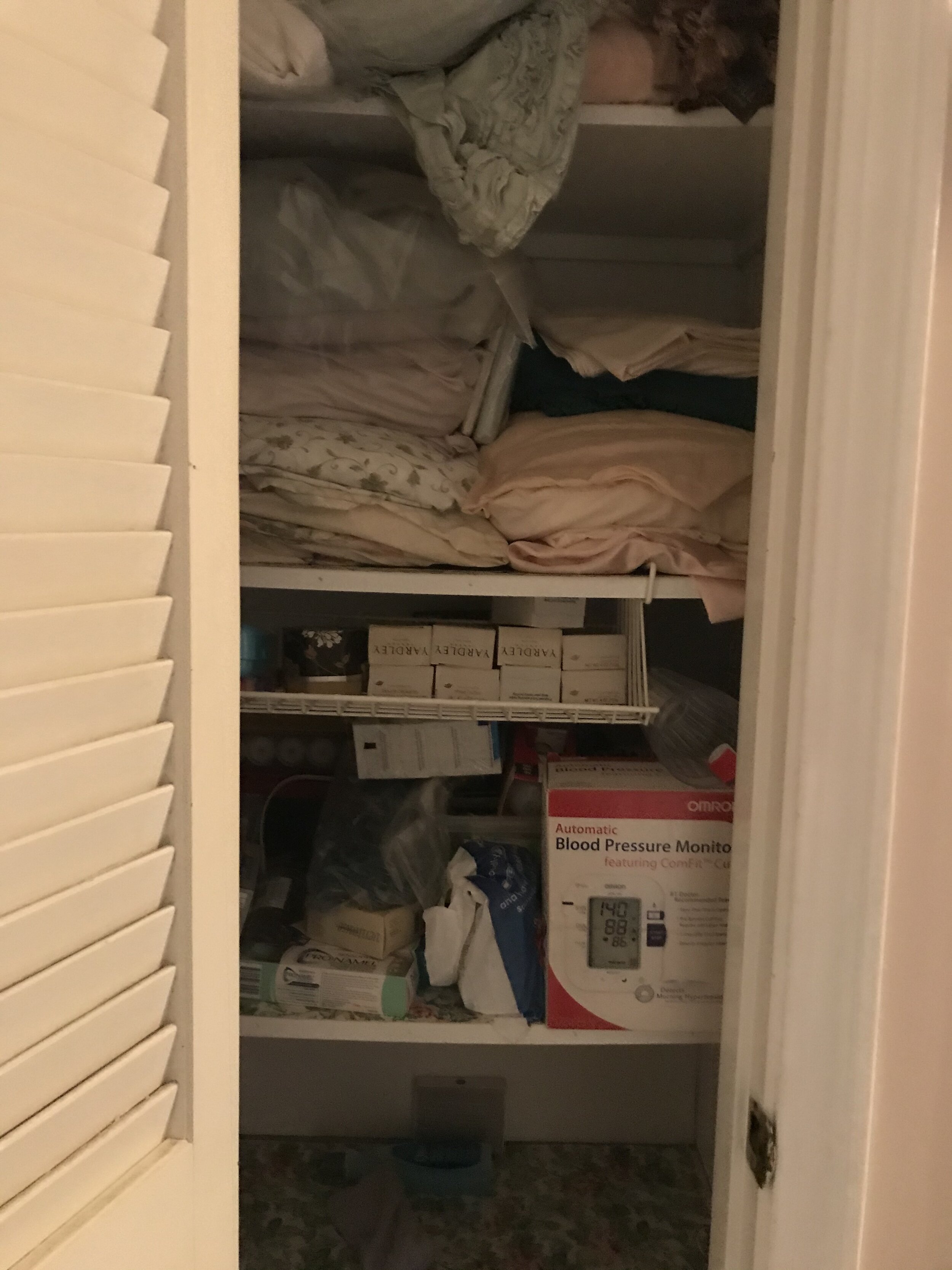 Linen closet - before