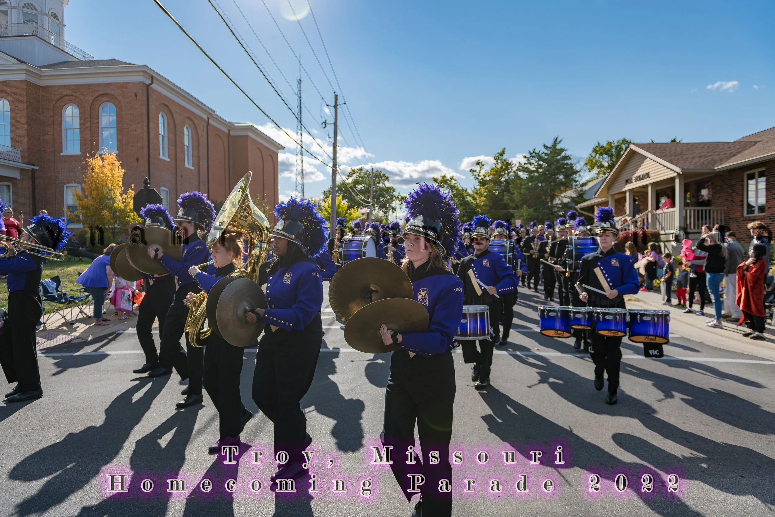 Cymbal players and drummers march together along the route during the 2022 Troy Homecoming Parade.