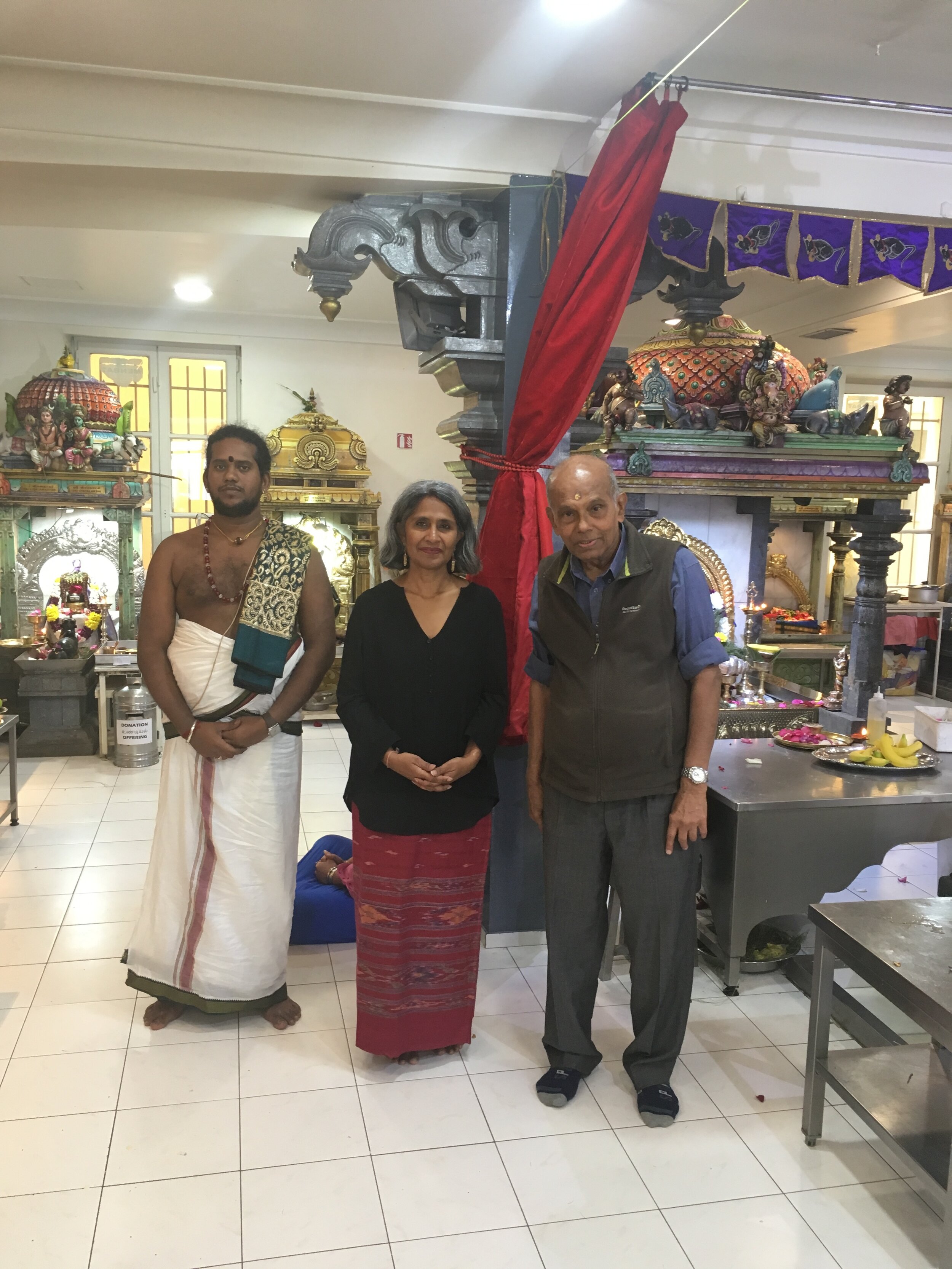 L to R: Priest Gurumurthy, Sunita, Jaya Ratnam 
