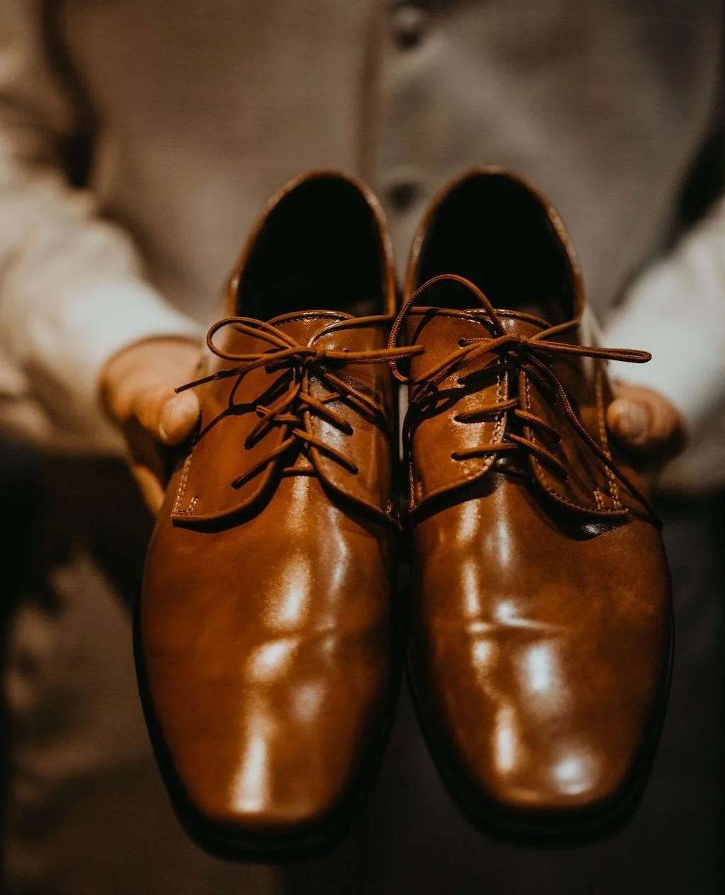 Even the smallest details carry weight on a wedding day. A polished pair of shoes is more than an accessory, it’s a quiet symbol of readiness, grounding him before the walk down the aisle. 
These intentional moments remind us that preparatio