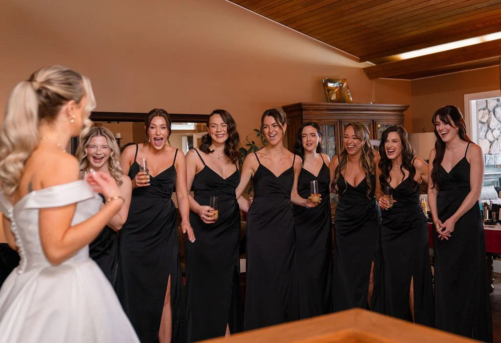 The first reveal of the bride in her gown on her wedding day is always a moment of pure magic. 
It’s a carefully curated pause, sharing the joy and excitement with her closest friends and family. These reactions capture more than admiration;