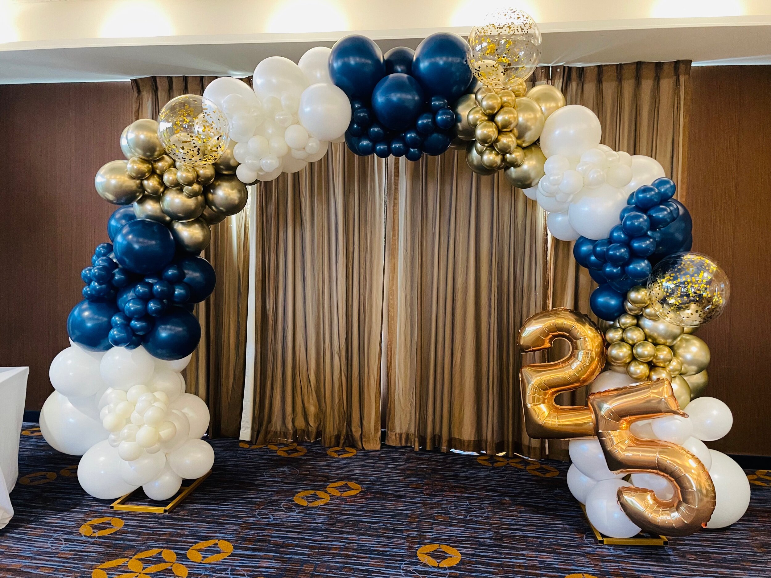 Gold Metal Ring Backdrop with Custom Balloon Garland – Rental for Events