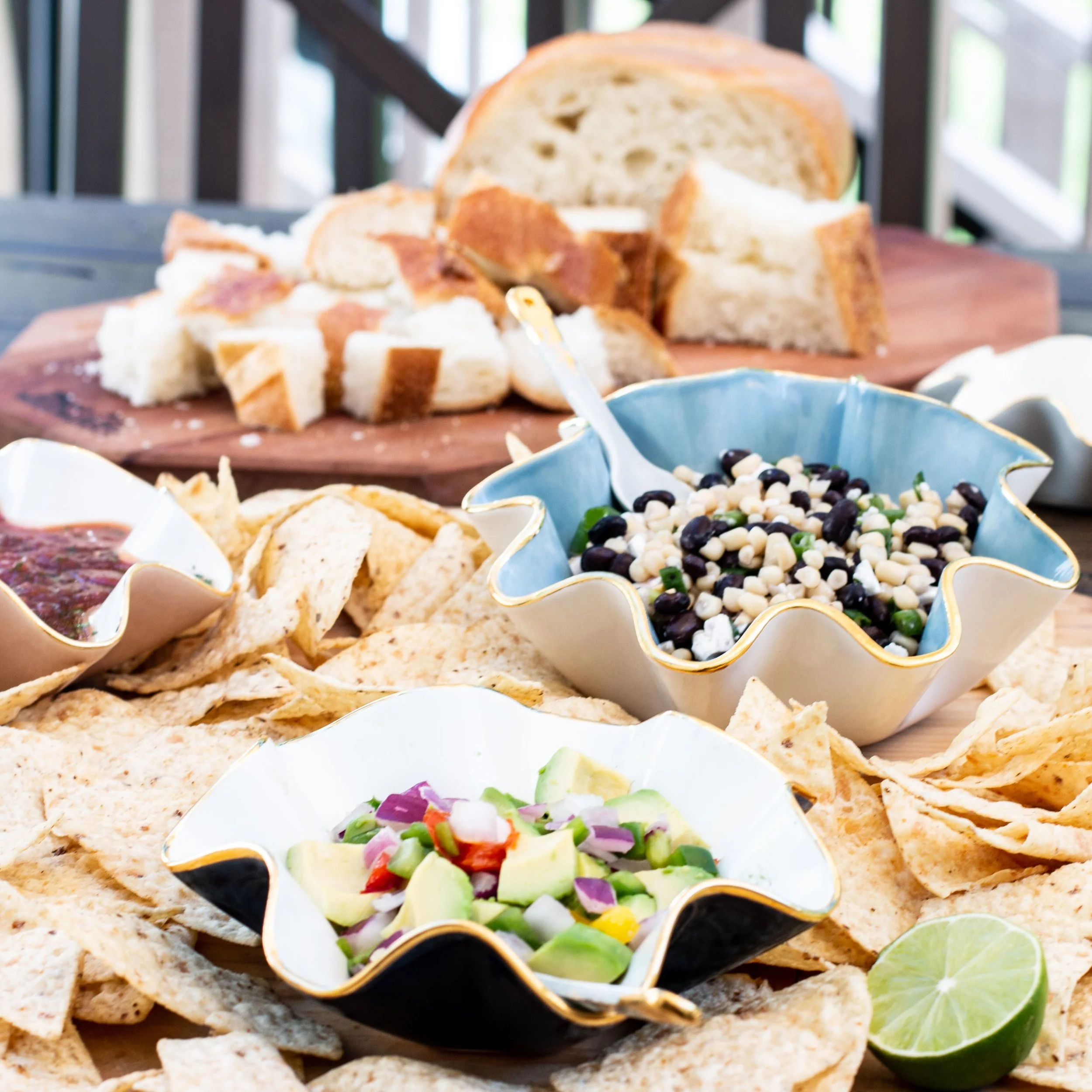 Mix wavy bowls in assorted sizes for dips and spreads - shop here.
