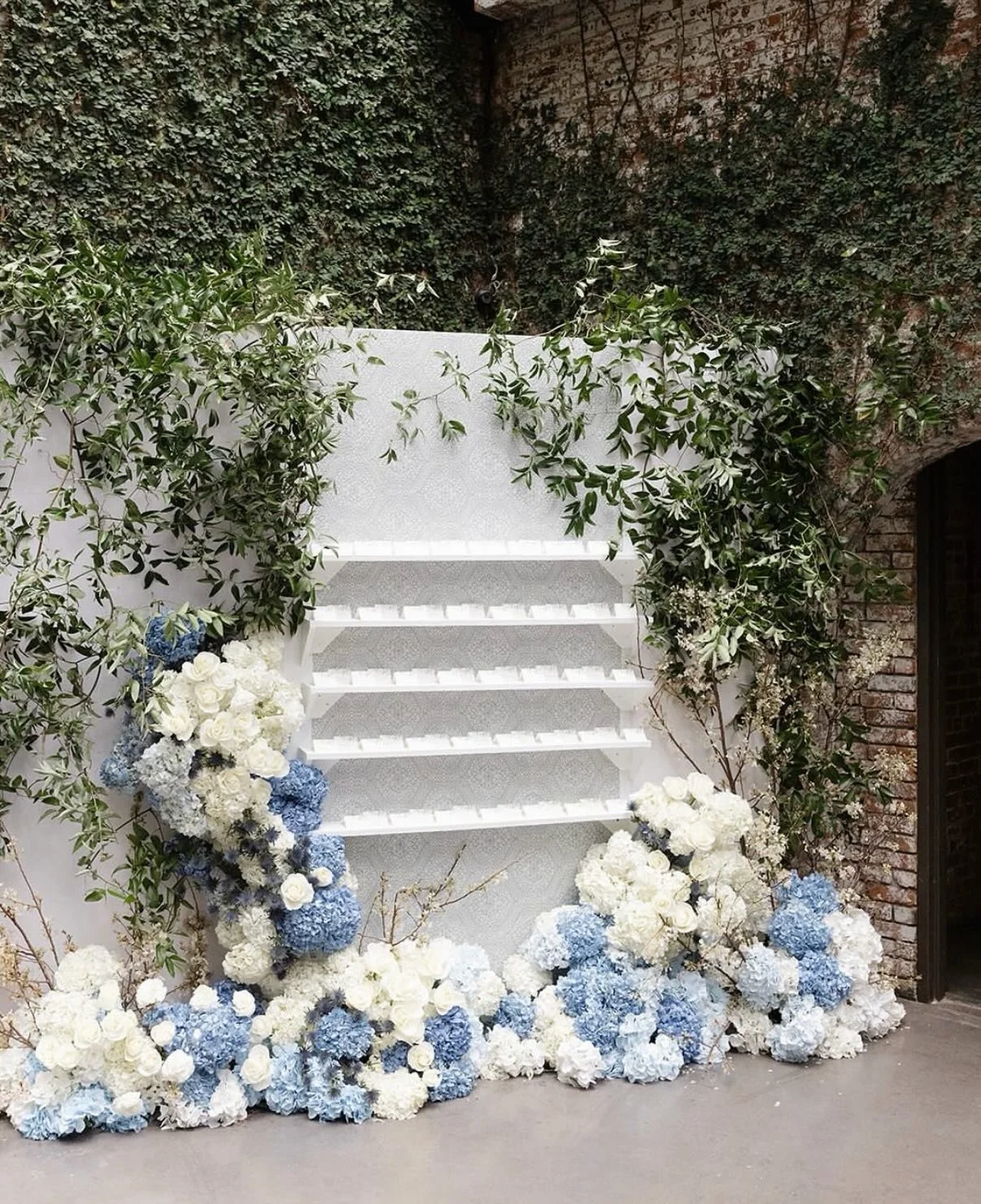 A favorite design detail is an escort card display that makes a statement and makes things effortless. 
 Beautiful at first glance, simple to navigate, and perfectly placed to keep guests moving right into the celebration.

Team:
@rachelbeharevents
@