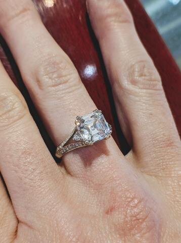 This 18k white gold Asscher cut diamond engagement ring in Secrète's Washington DC store shows off the Art Deco elegance of this cut.